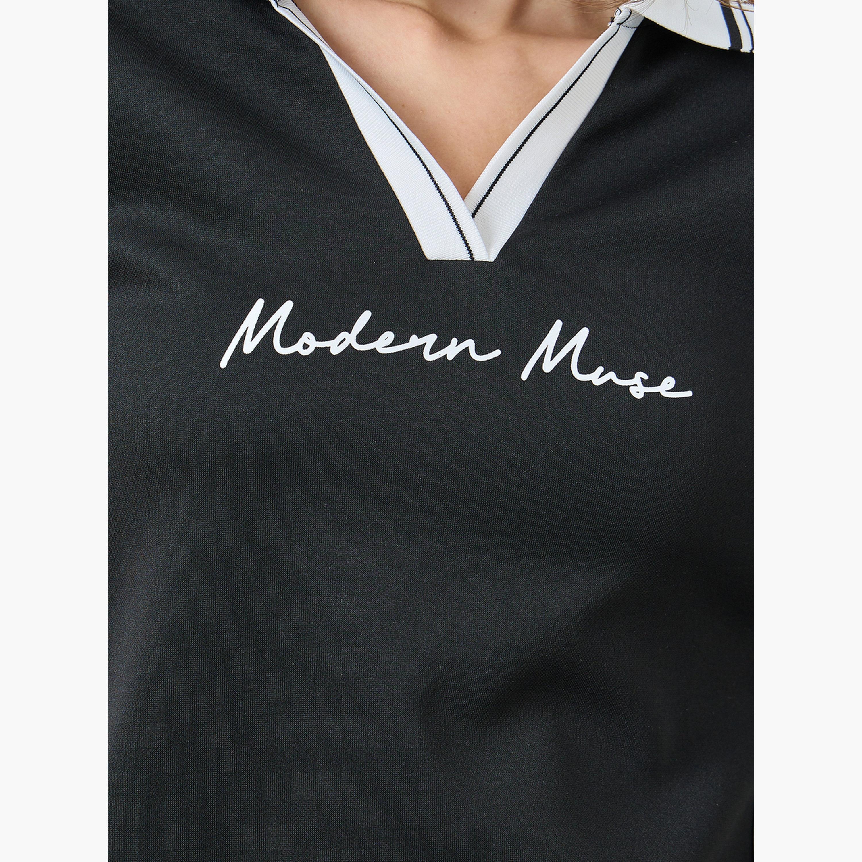 ستايلي - تي شيرت بولو أسود تصميم واسع بتفاصيل مخططة للنساء-women-clothing-tshirts-image-3
