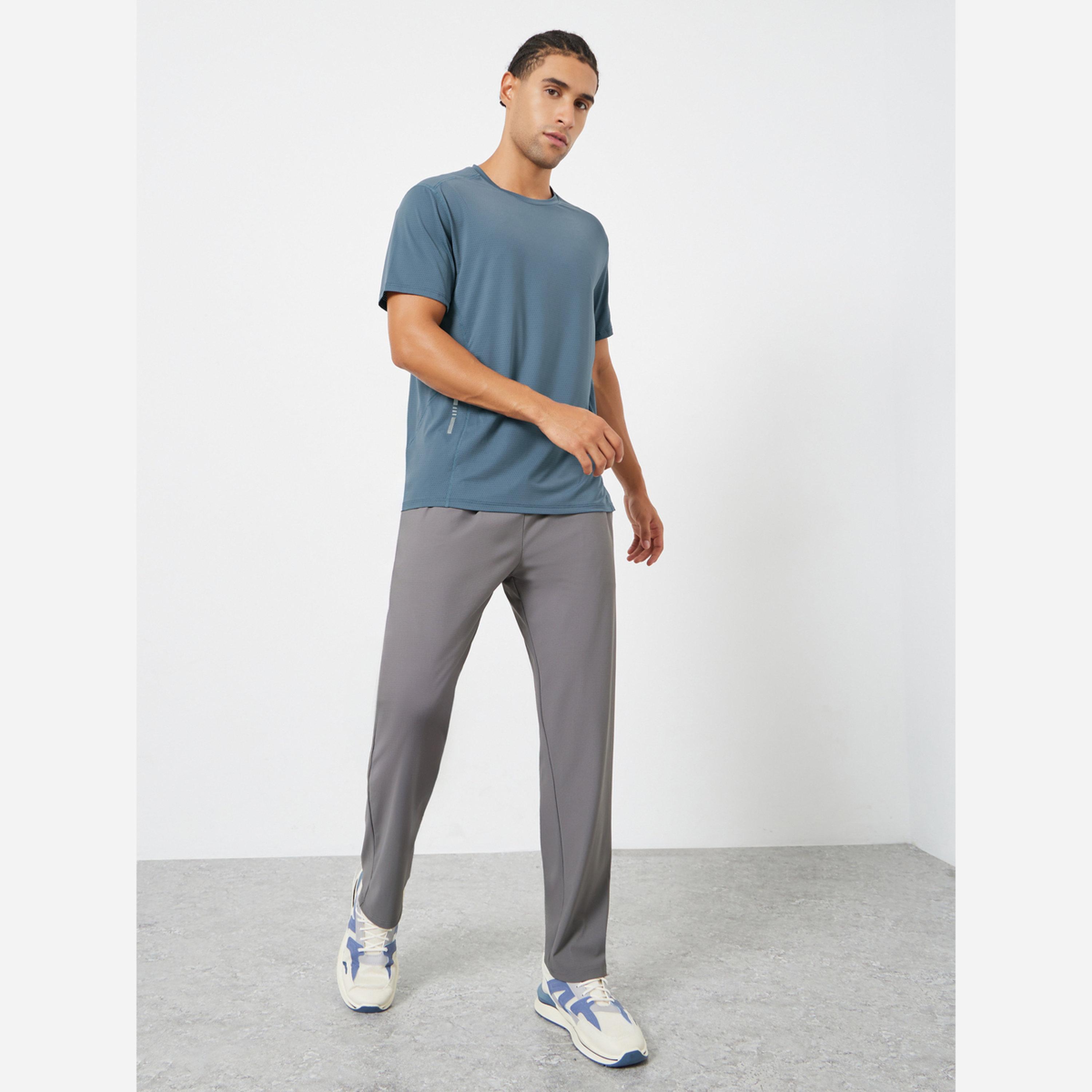 ستايلي - قميص رياضي بدون أكمام سريع الجفاف، وملمس مميز-men-clothing-sportswearandactivewear-tshirtsandpolos-image-2