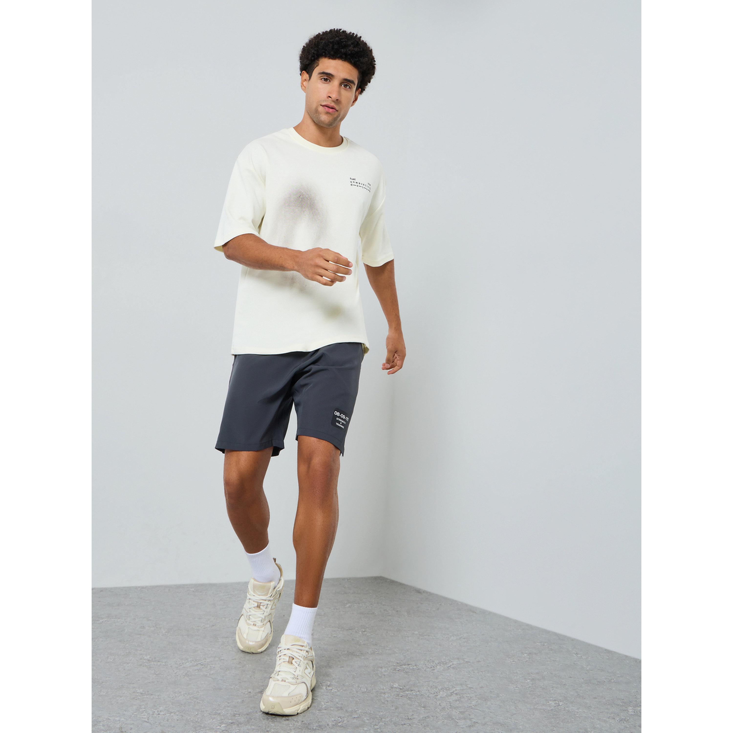 Styli Men Cream Oversized Slogan Print T-Shirt-men-clothing-sportswearandactivewear-tshirtsandpolos-image-2
