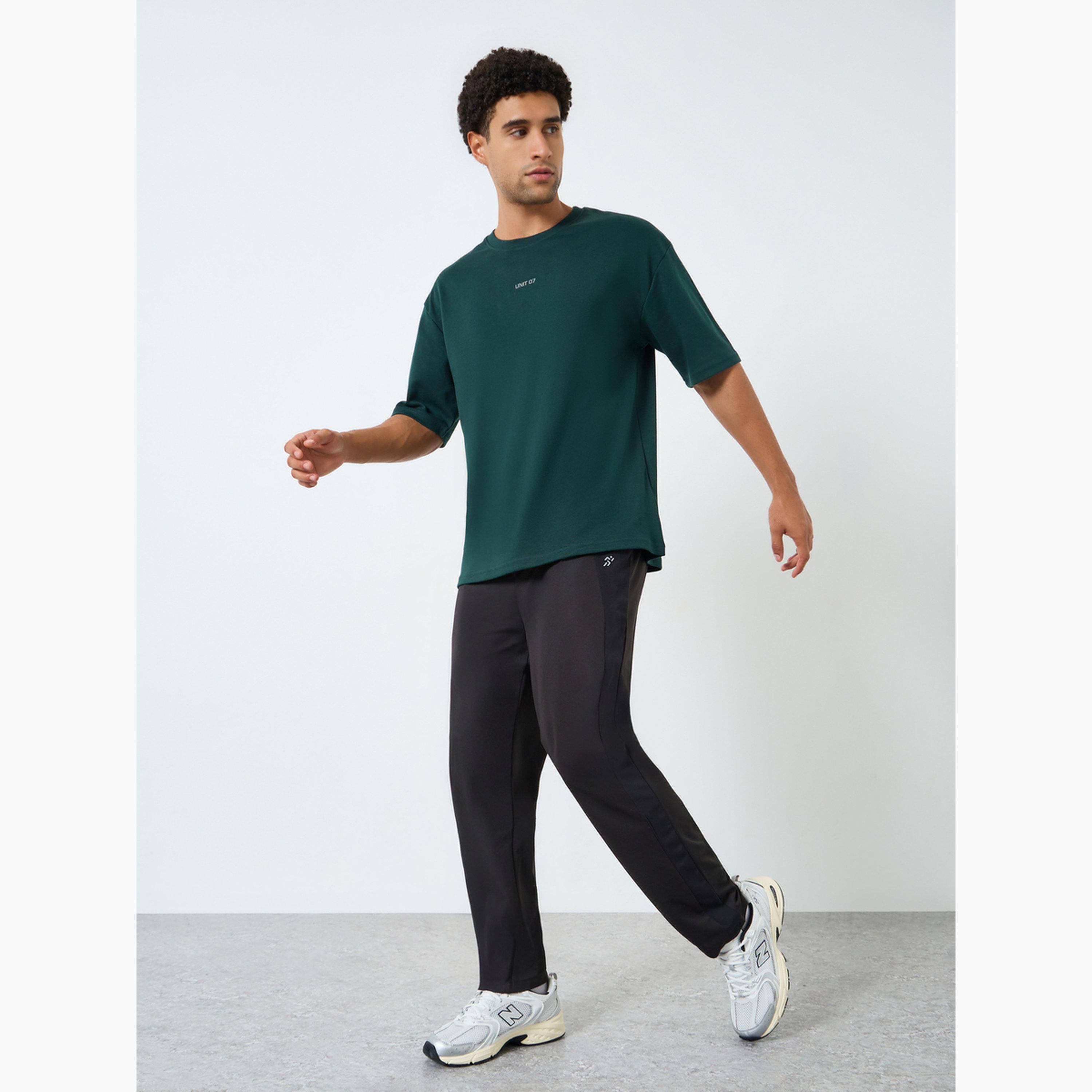 تيشيرت بقصة واسعة للرجال-men-clothing-sportswearandactivewear-tshirtsandpolos-image-2