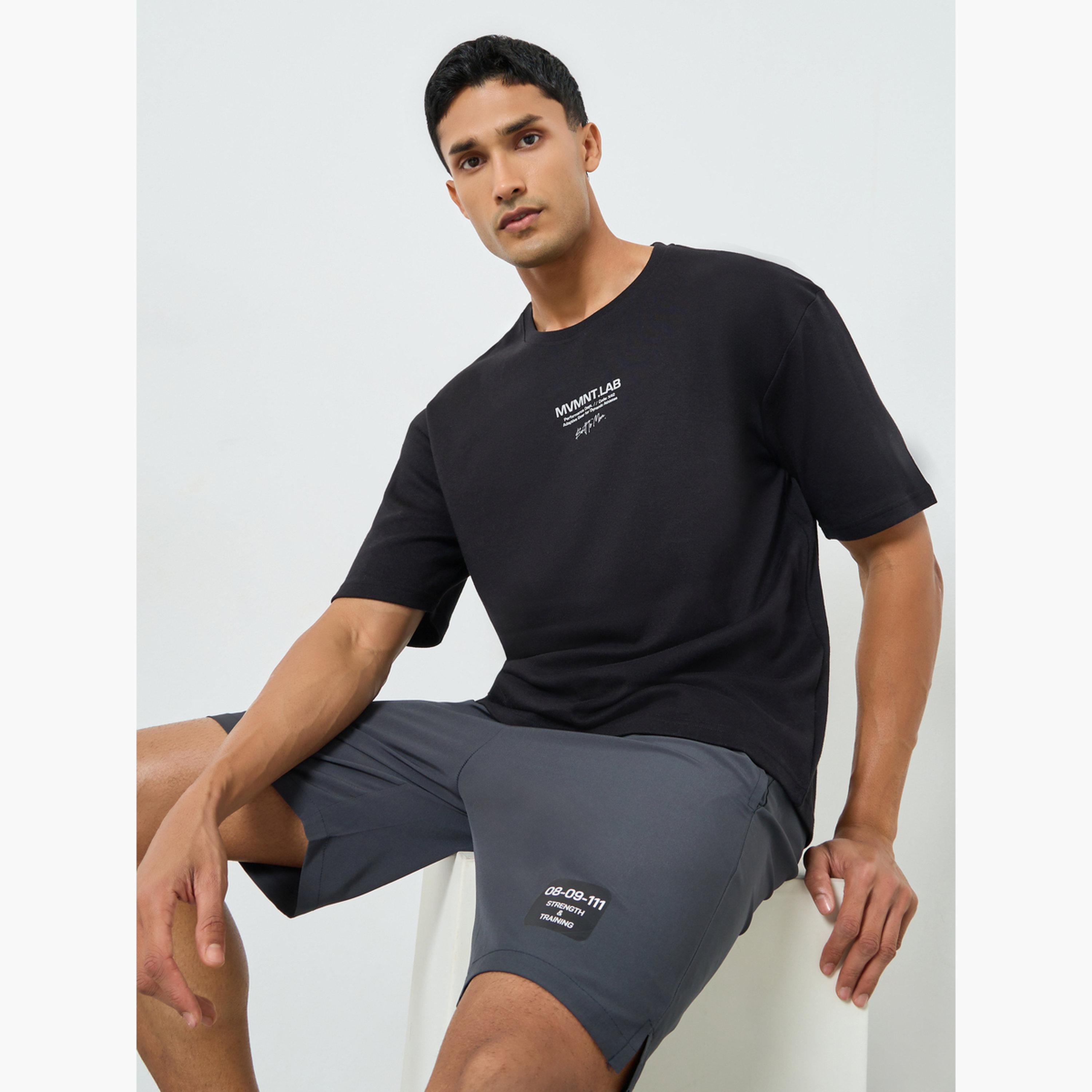 تيشيرت بقصة واسعة وطبعة أمامية صغيرة للرجال-men-clothing-sportswearandactivewear-tshirtsandpolos-image-3