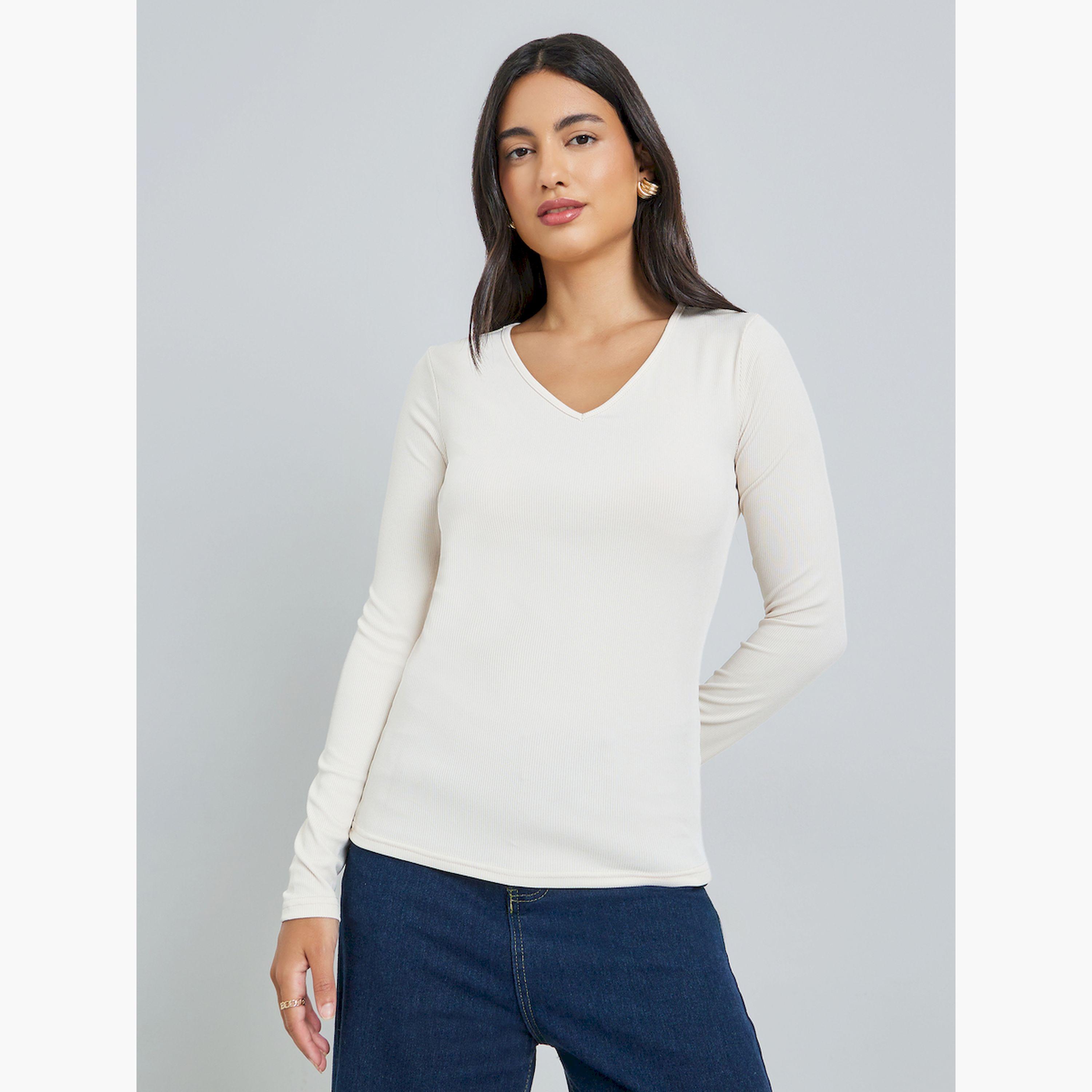 ستايلي - بلوزة بأكمام طويلة محبوكة مضلعة لون أبيض كريمي-women-clothing-tshirts-image-1