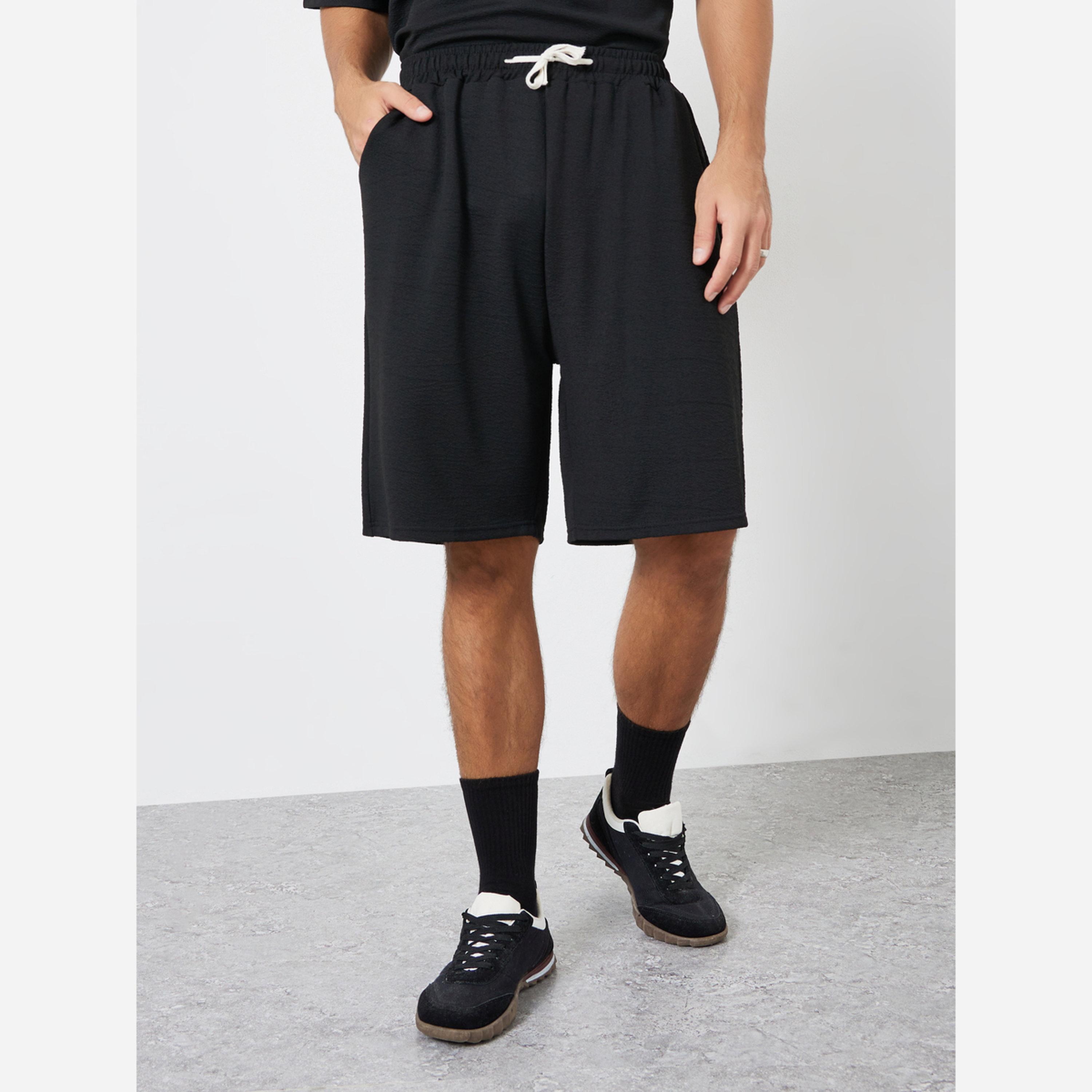 Styli Men Black Oversized T-Shirt and Shorts Co-Ords-men-clothing-coordsets-image-4