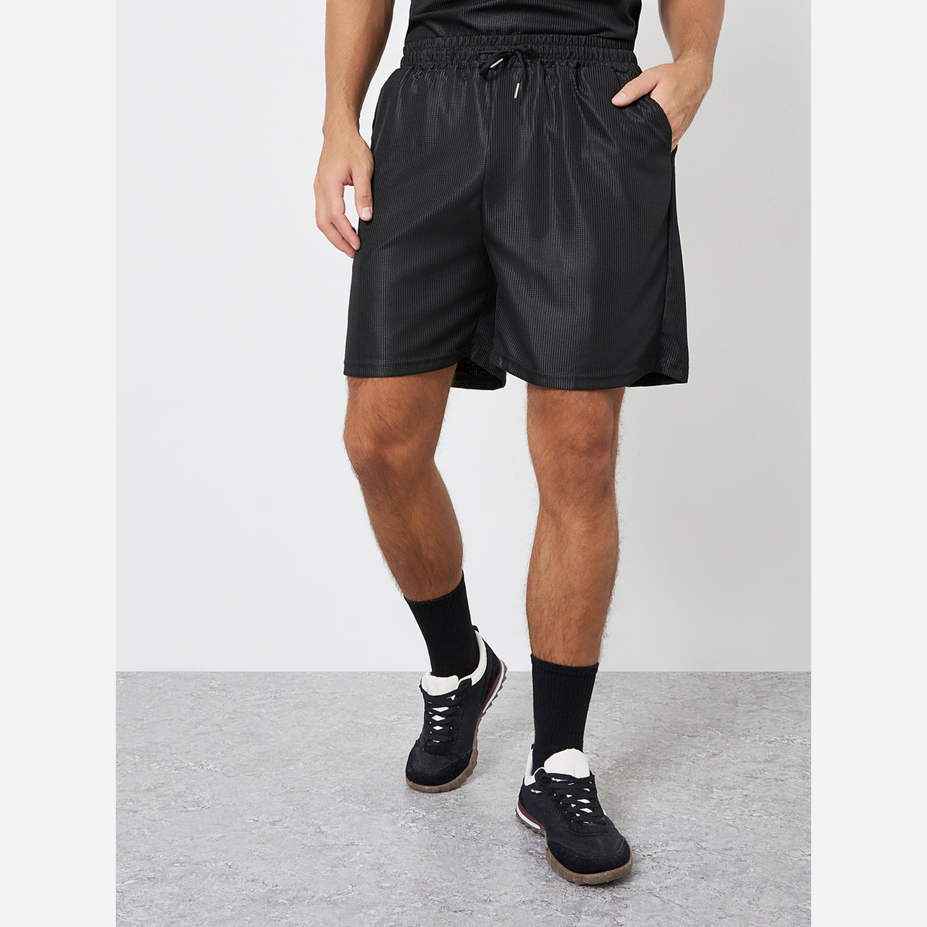 Styli Men Black Oversized Solid Polo and Shorts Co-Ords-men-clothing-coordsets-image-4