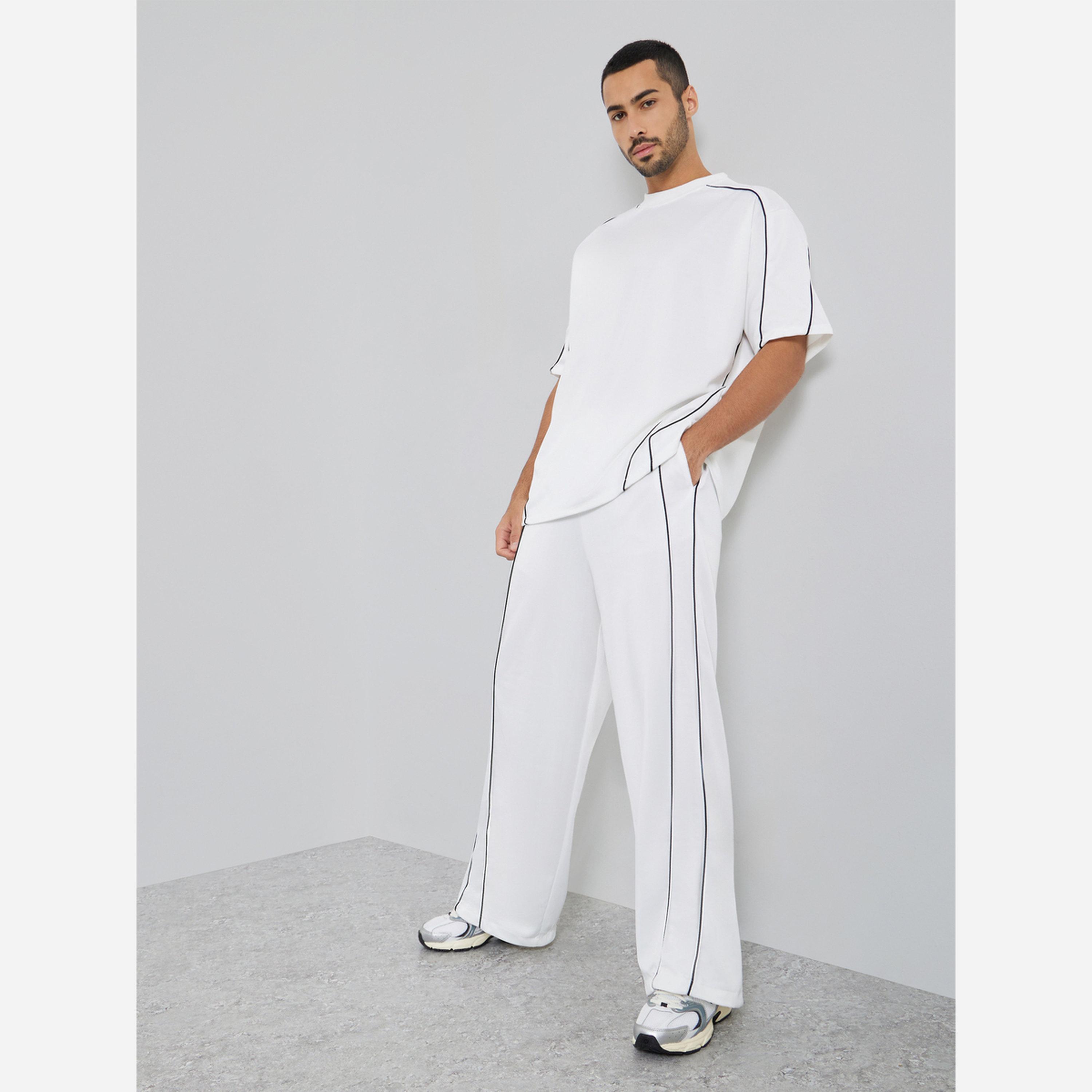 Styli Men White Oversized Piping Detail T-Shirt and Pants Co-Ords-men-clothing-coordsets-image-1