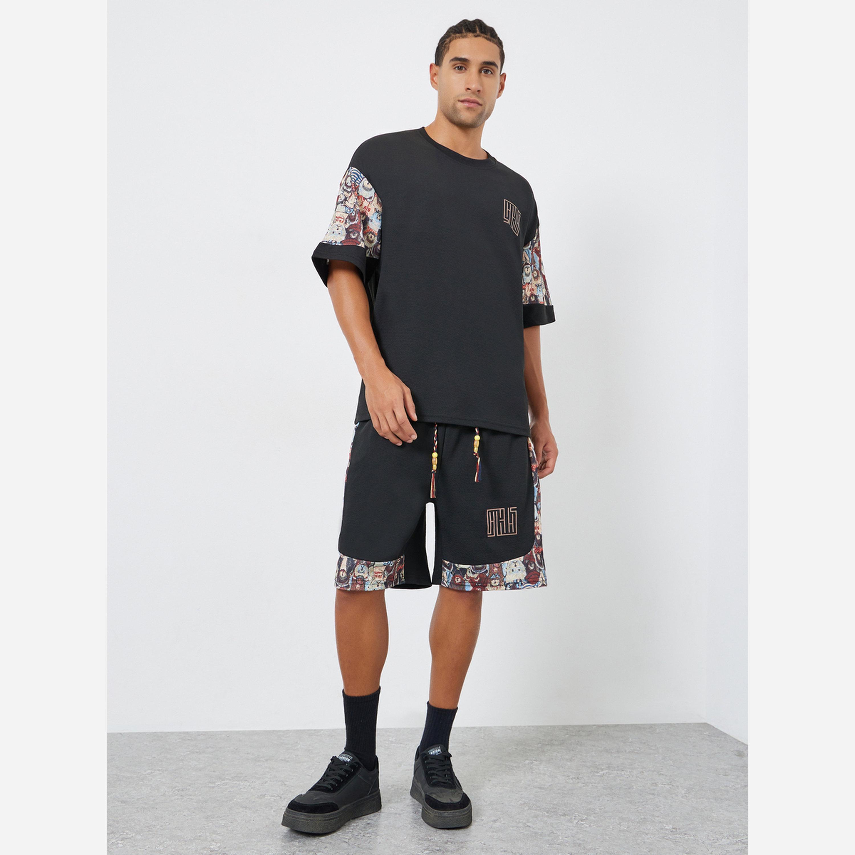 ستايلي - طقم رجالي لون أسود مقاس واسع طبعة رسومات-men-clothing-coordsets-image-2