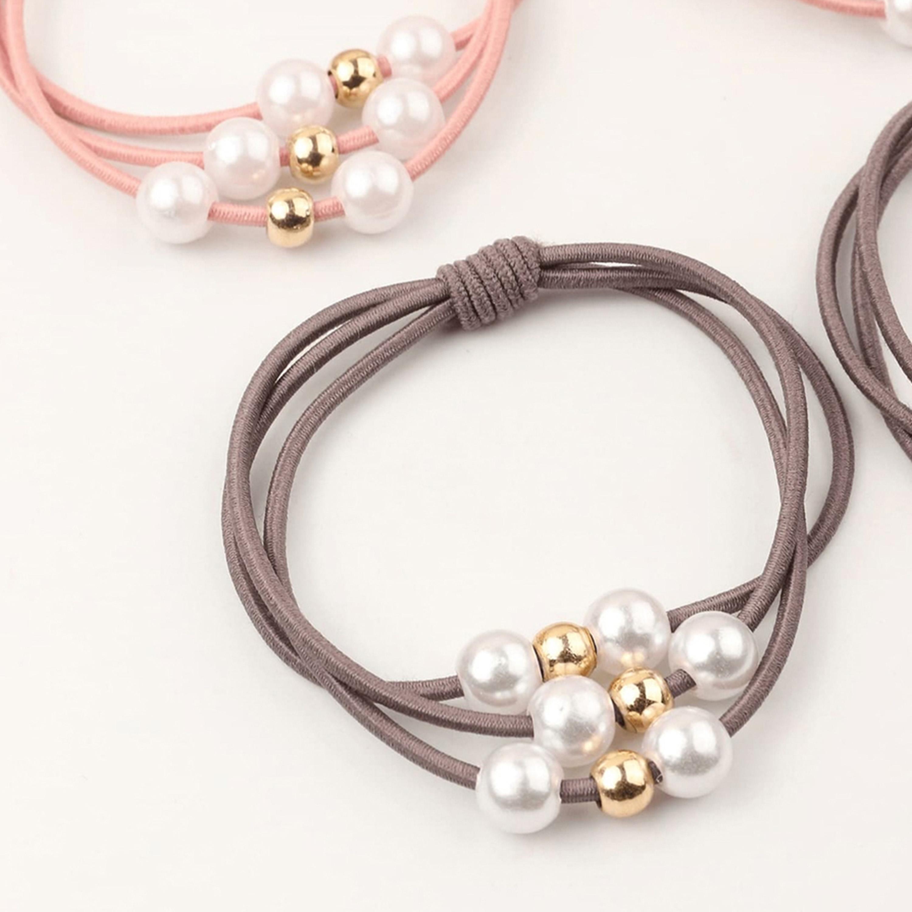 تيك تو - طقم 12 ربطة شعر من اللؤلؤ الصناعي-women-hairaccessories-bands-image-4