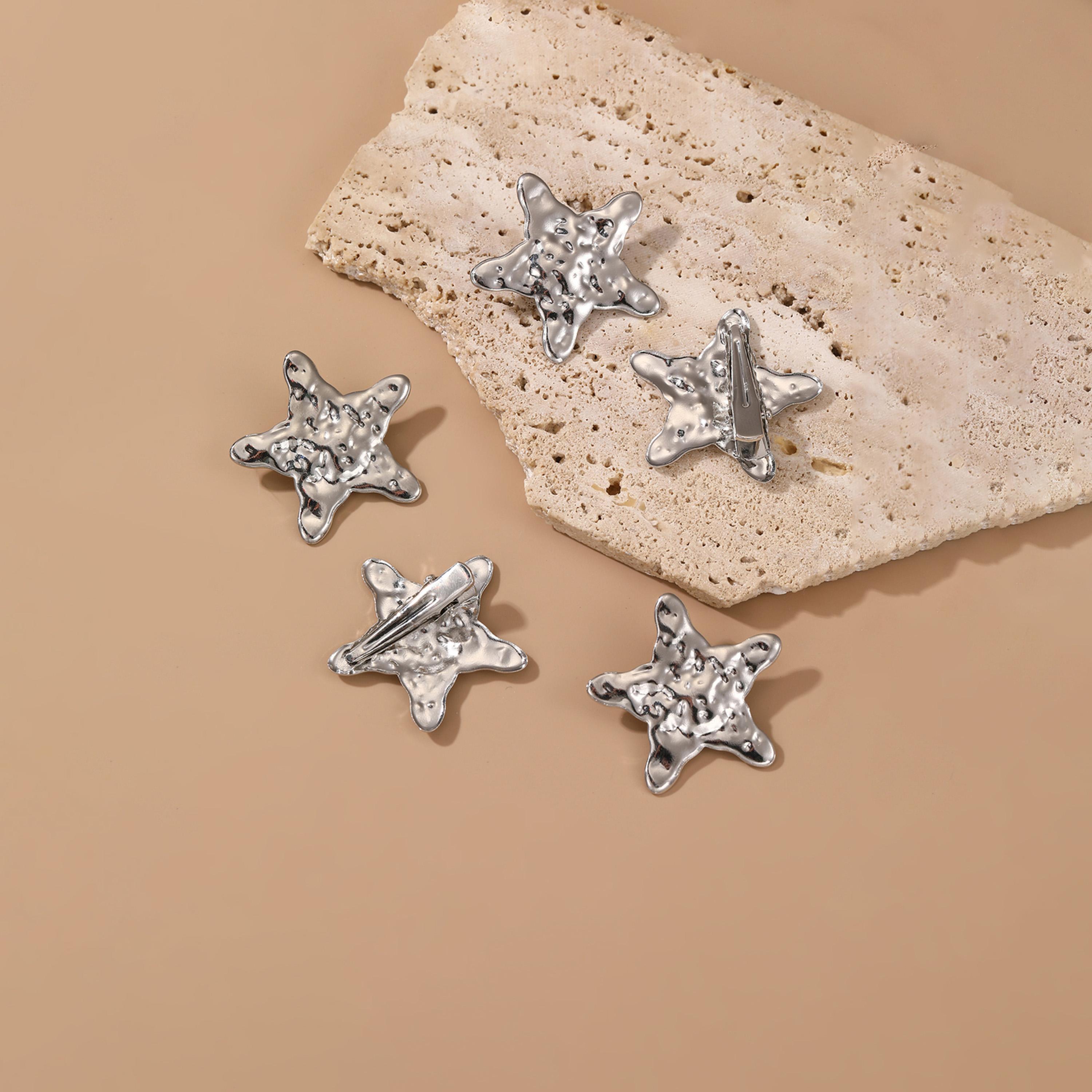تيك تو - مشبك شعر مزين بنجوم فضية-women-hairaccessories-clips-image-1