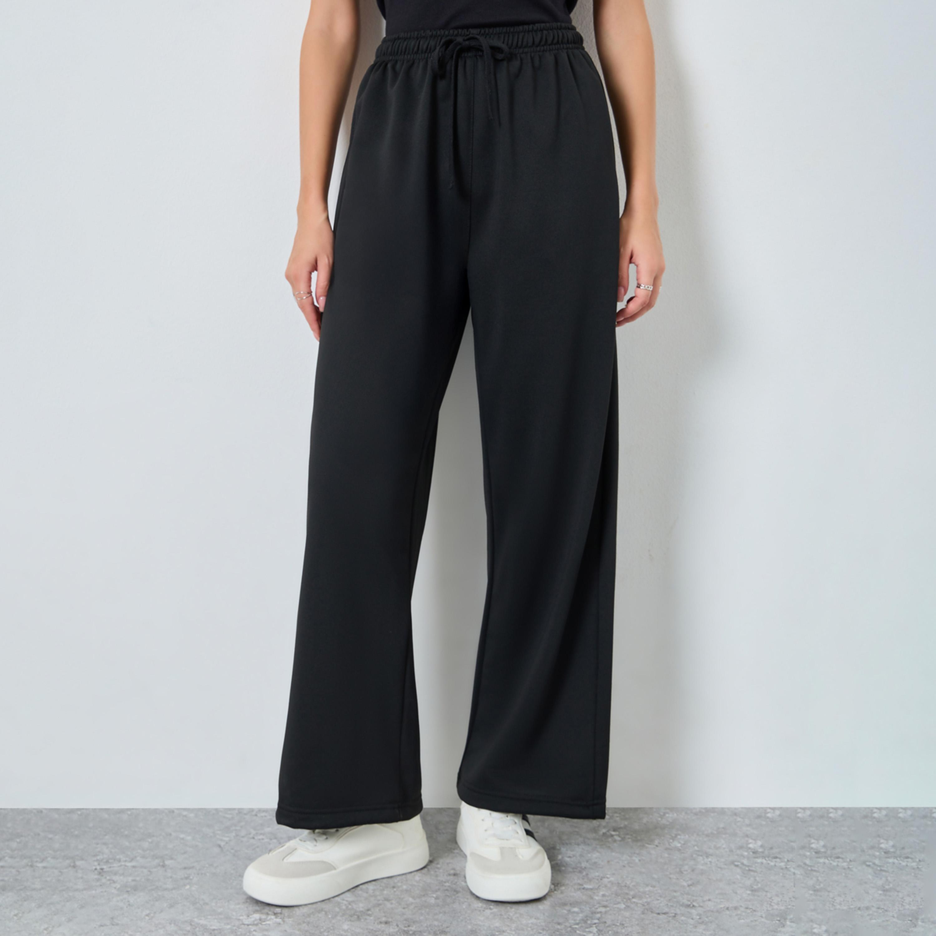 Styli Women Black Solid Wide Leg Joggers-women-clothing-bottoms-joggers-image-1