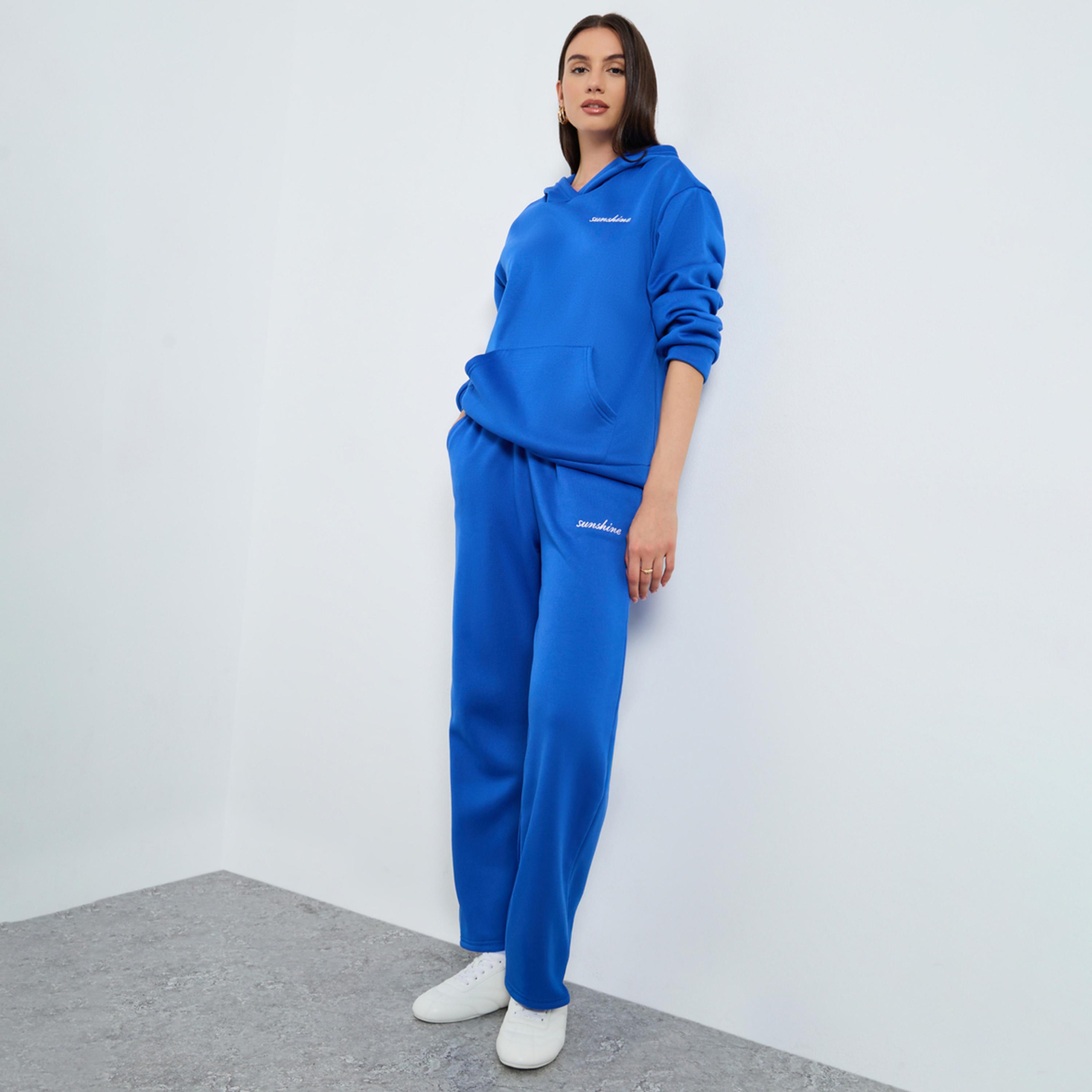 ستايلي - تنسيقات هودي وبنطال رياضي مطرز لون أزرق-women-clothing-coordsets-image-1