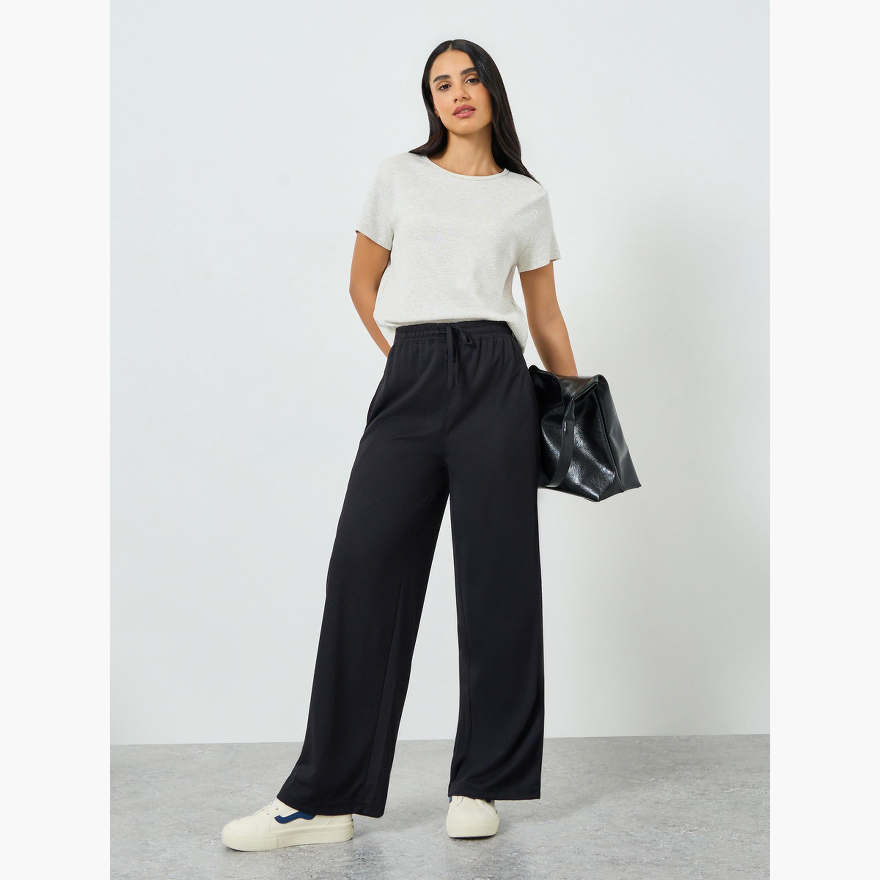 بنطال جوغر بأرجل واسعة ورباط-women-clothing-bottoms-joggers-image-2