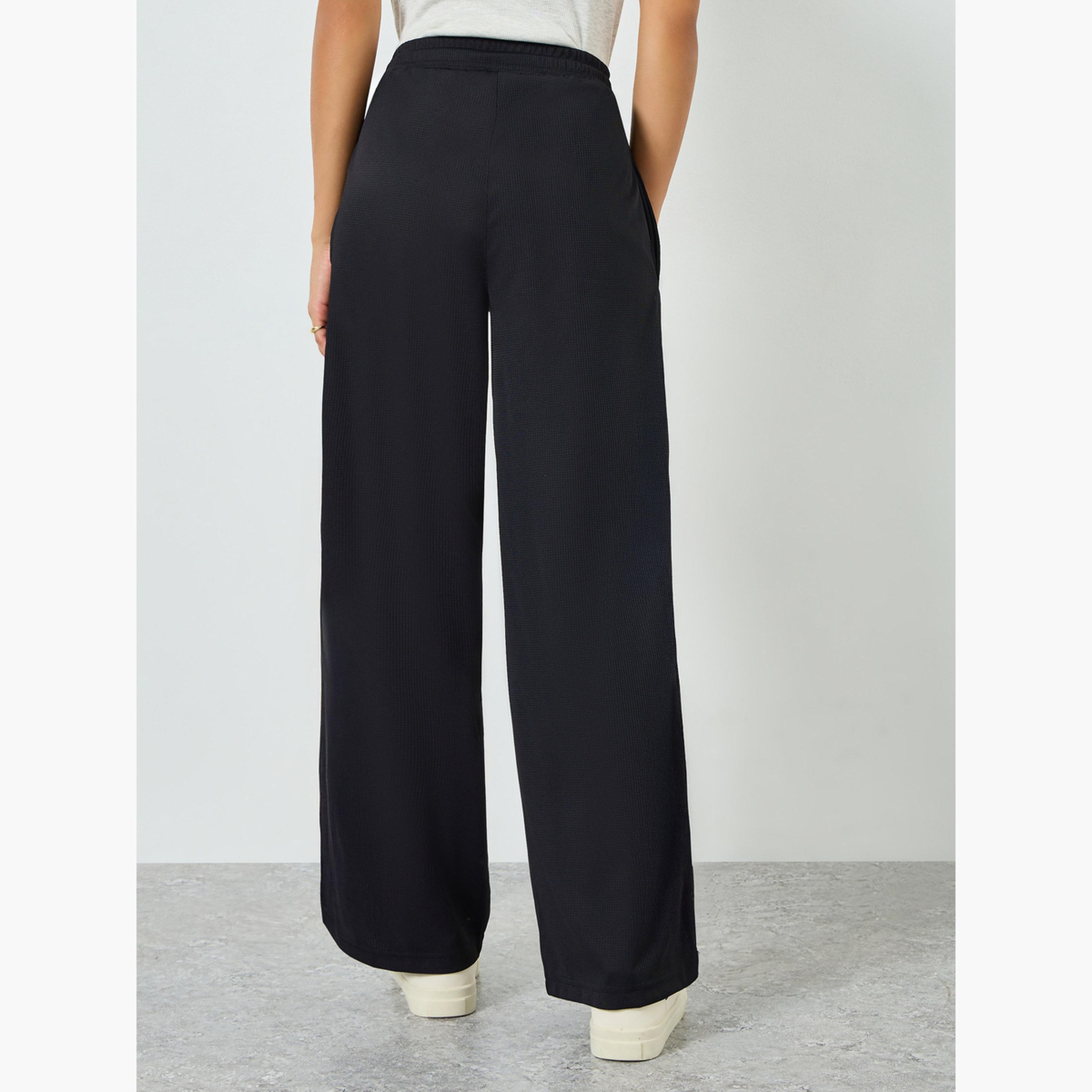 بنطال جوغر بأرجل واسعة ورباط-women-clothing-bottoms-joggers-image-3