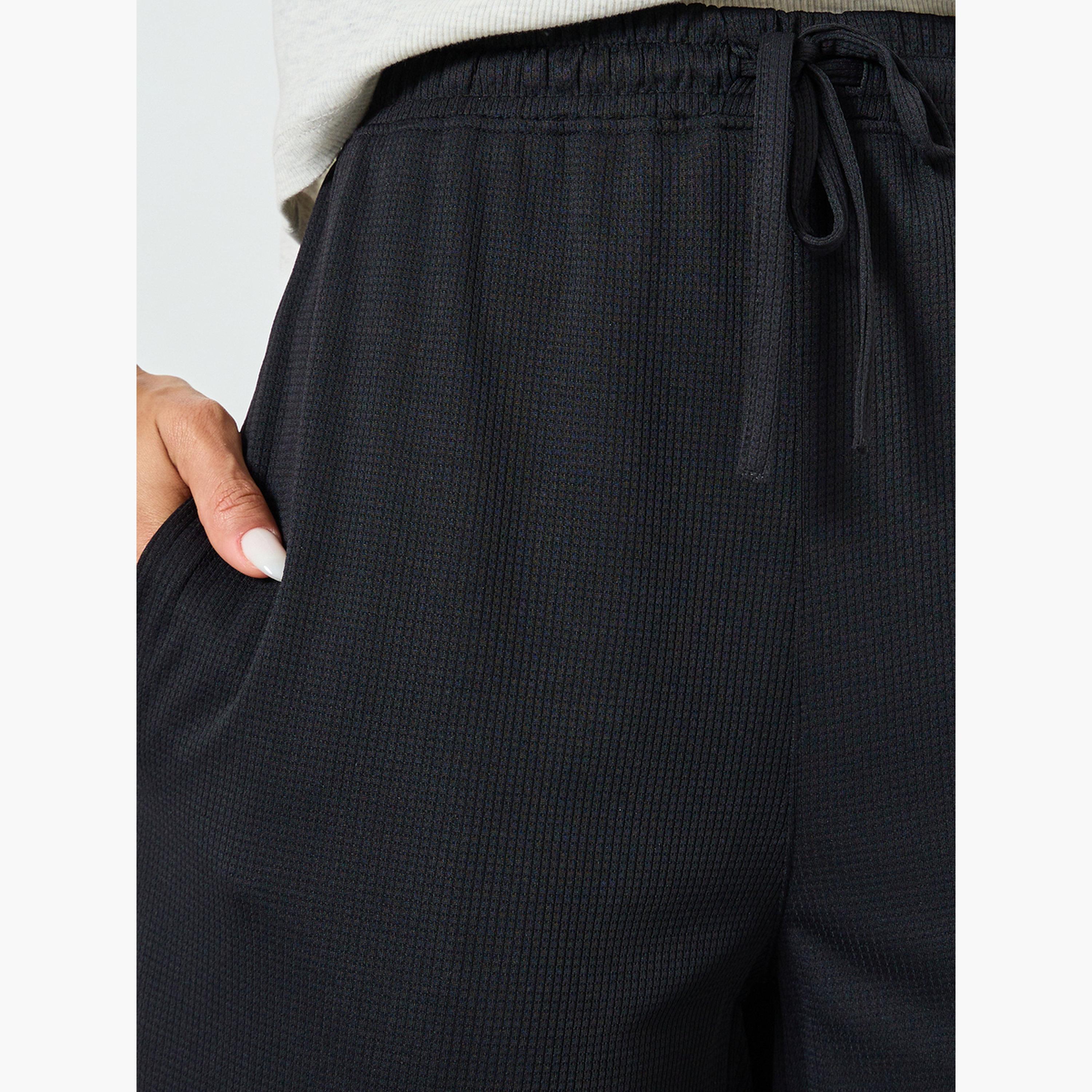 بنطال جوغر بأرجل واسعة ورباط-women-clothing-bottoms-joggers-image-4