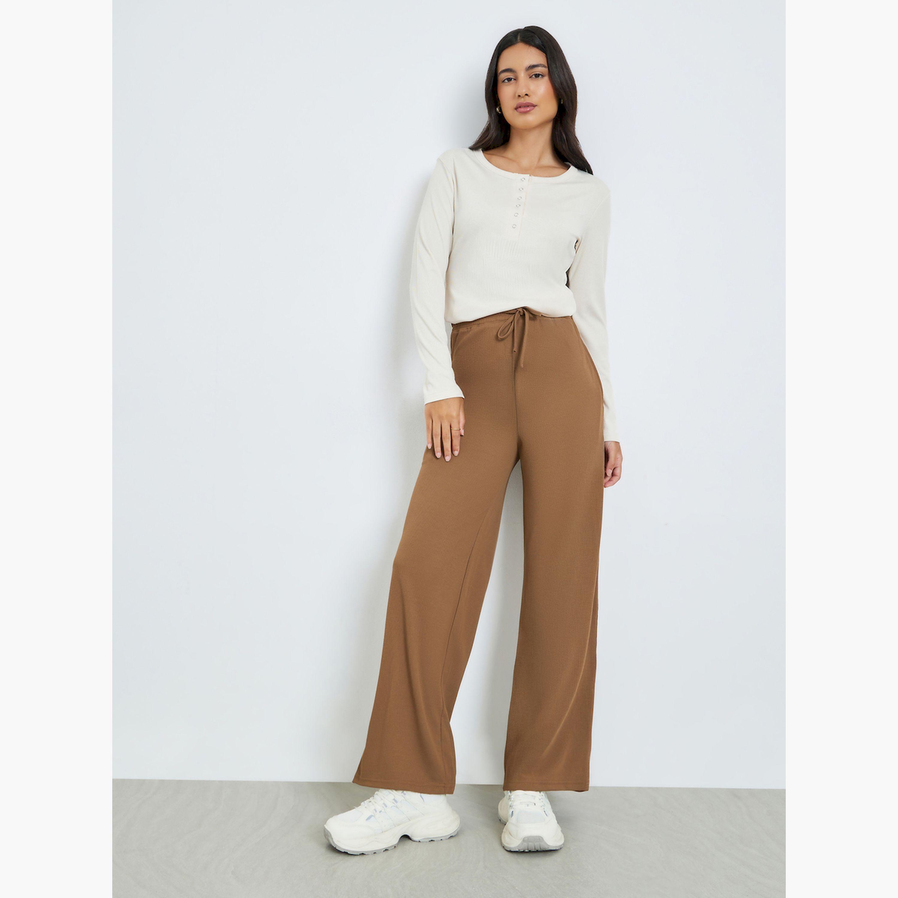 Styli Beige Solid Wide Leg Joggers-women-clothing-bottoms-joggers-image-2