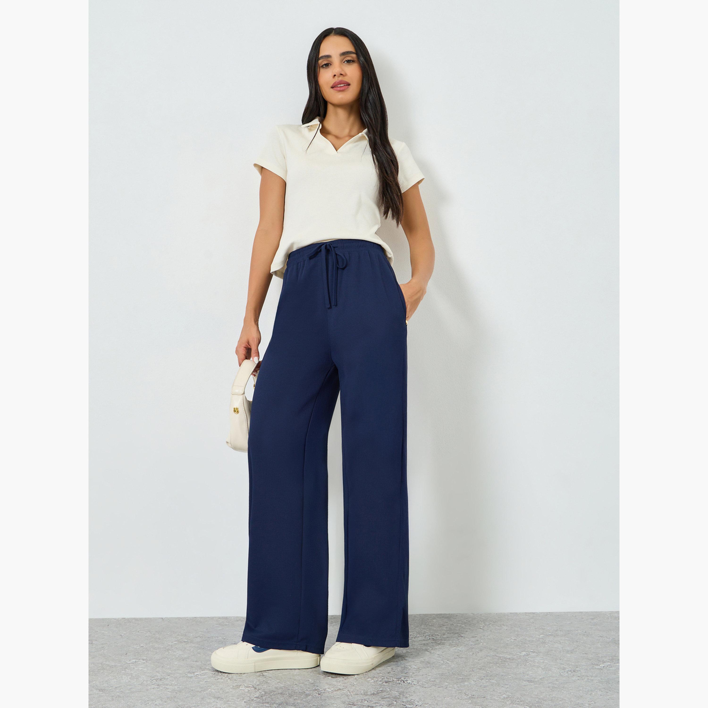 بنطال جوغر بأرجل واسعة ورباط-women-clothing-bottoms-joggers-image-2