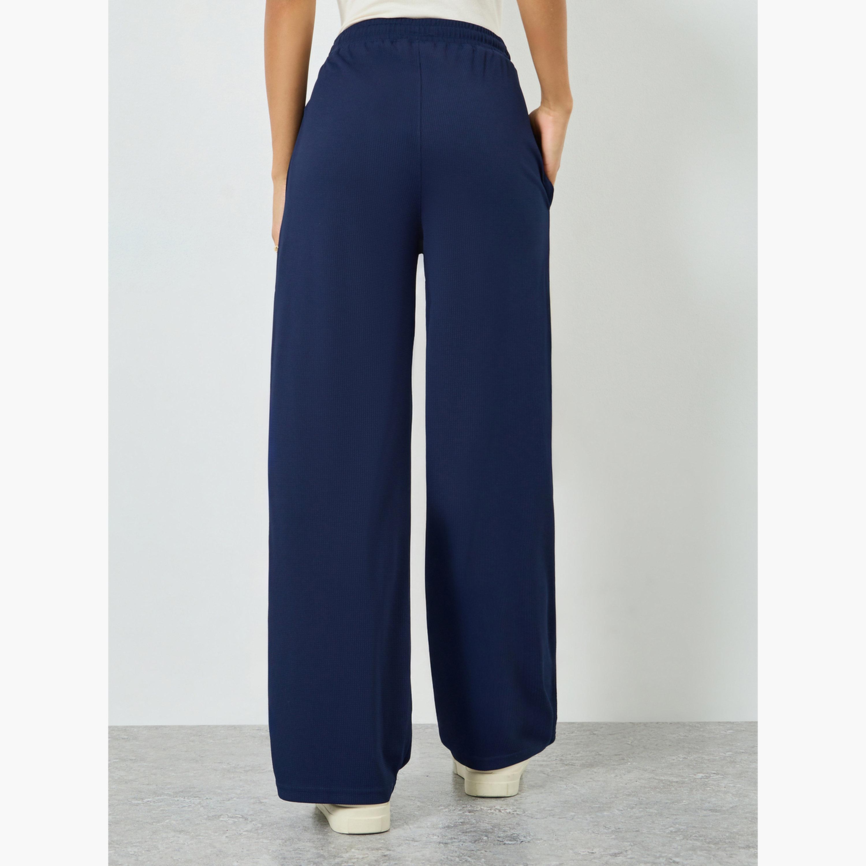 بنطال جوغر بأرجل واسعة ورباط-women-clothing-bottoms-joggers-image-3