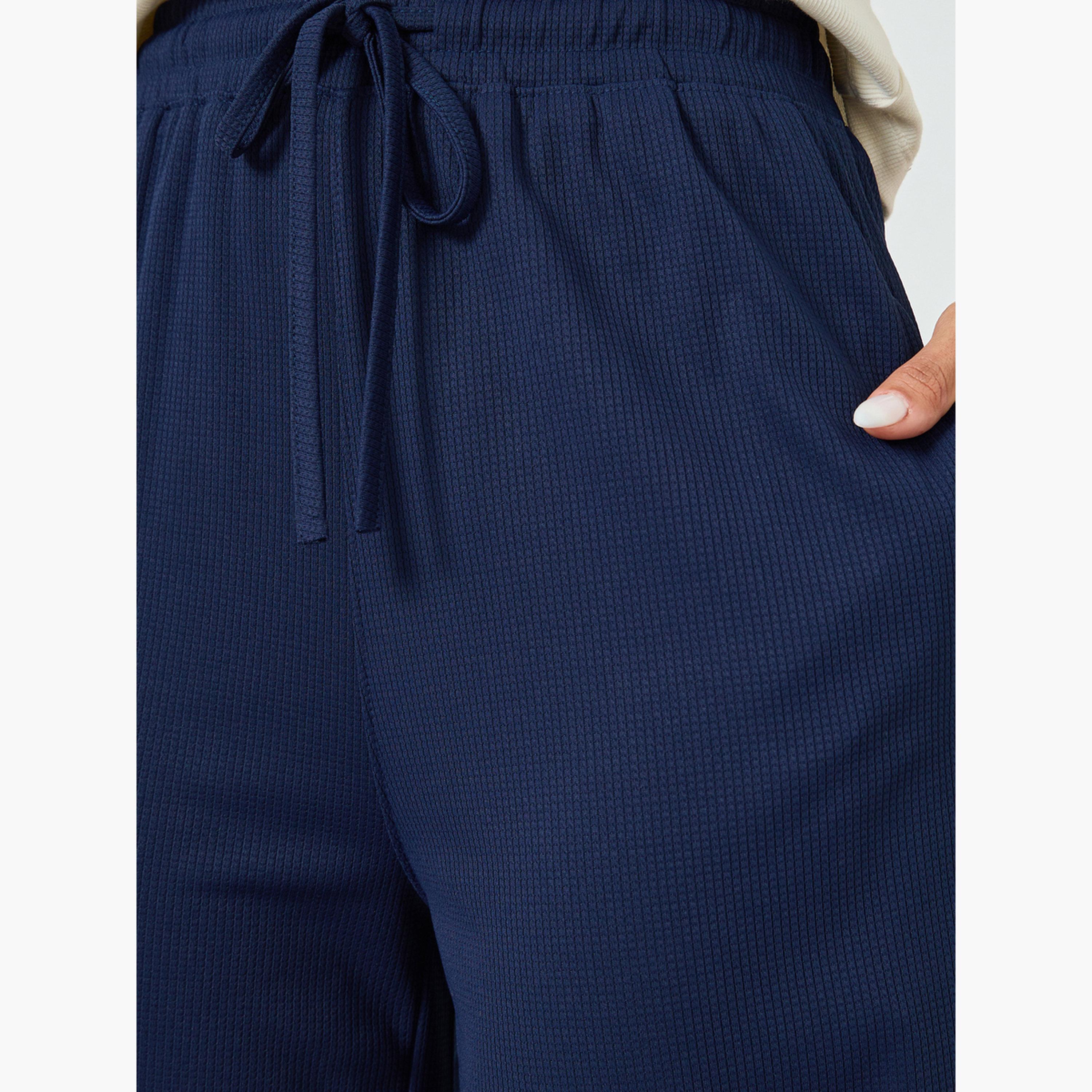 بنطال جوغر بأرجل واسعة ورباط-women-clothing-bottoms-joggers-image-4