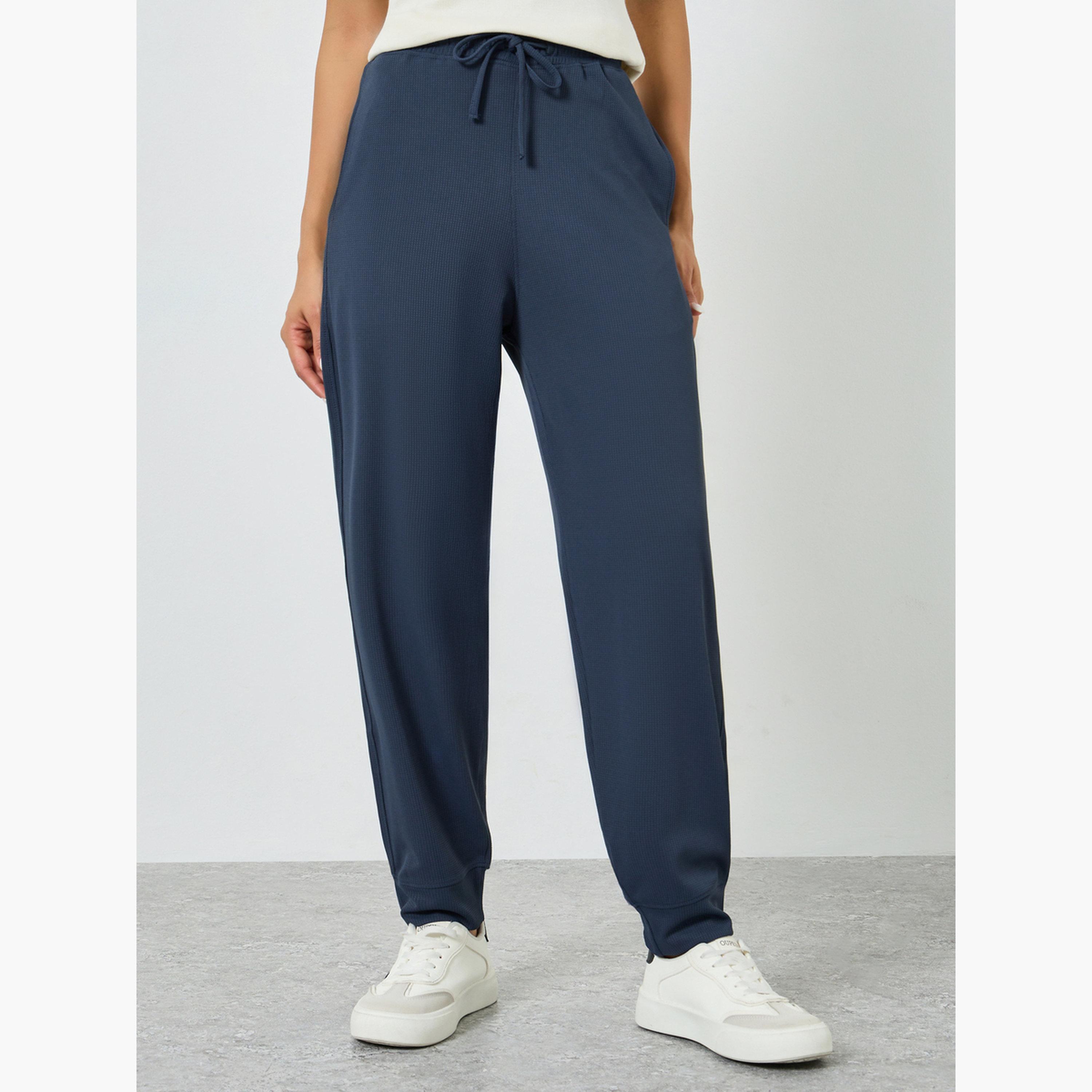 بنطال جوغر محبوك بنسيج وافل وقصة مريحة-women-clothing-bottoms-joggers-image-1