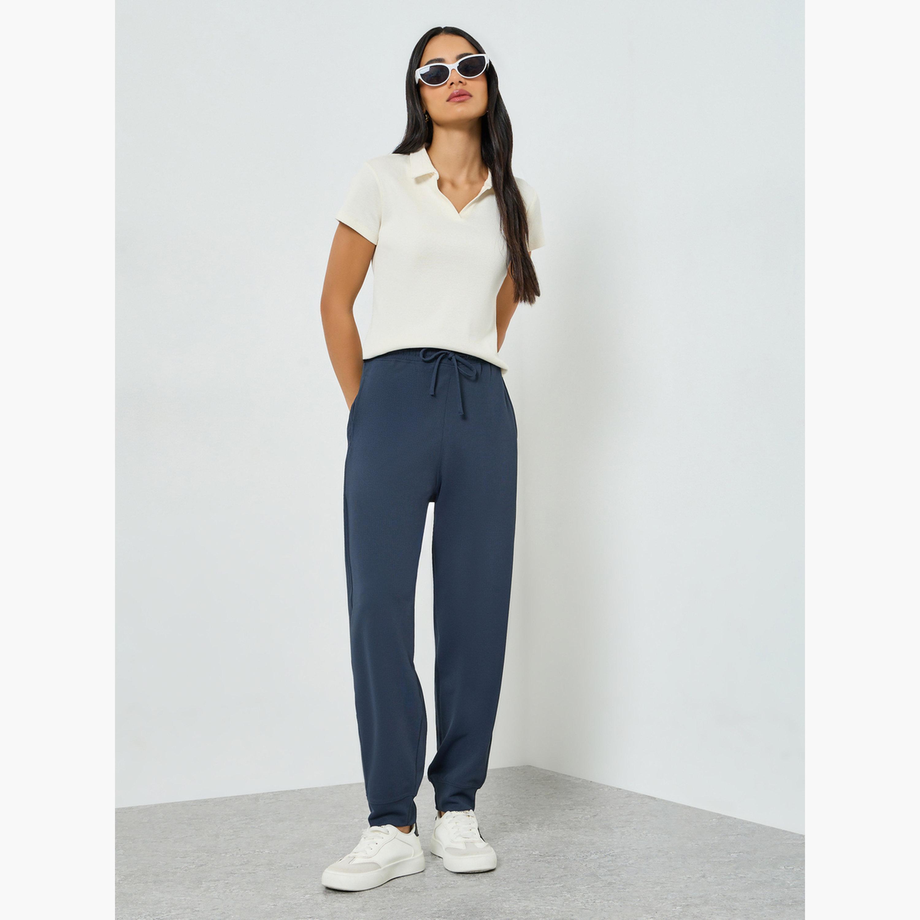 بنطال جوغر محبوك بنسيج وافل وقصة مريحة-women-clothing-bottoms-joggers-image-2