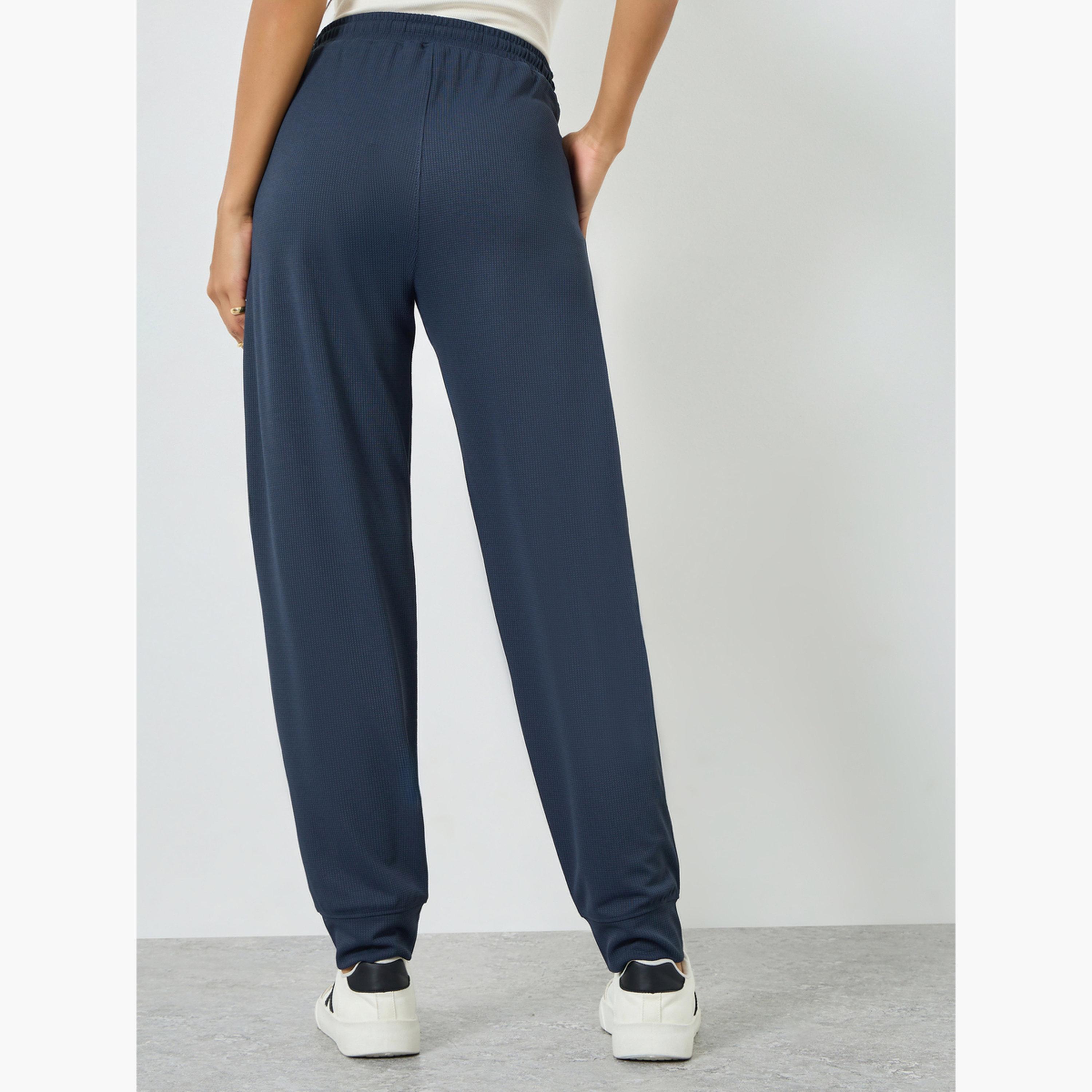 بنطال جوغر محبوك بنسيج وافل وقصة مريحة-women-clothing-bottoms-joggers-image-3