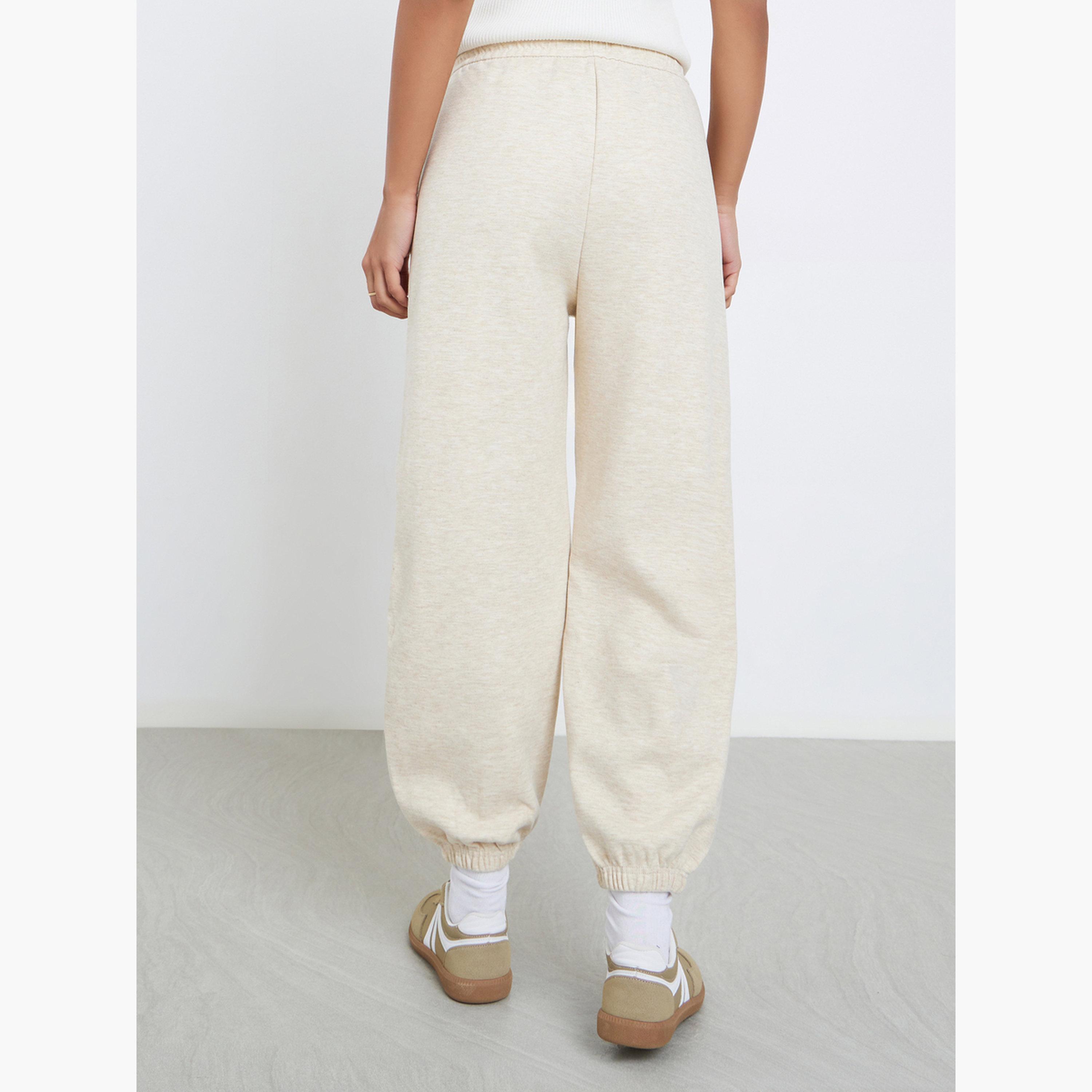Styli Women Cream Solid Cuffed Joggers-women-clothing-bottoms-joggers-image-4