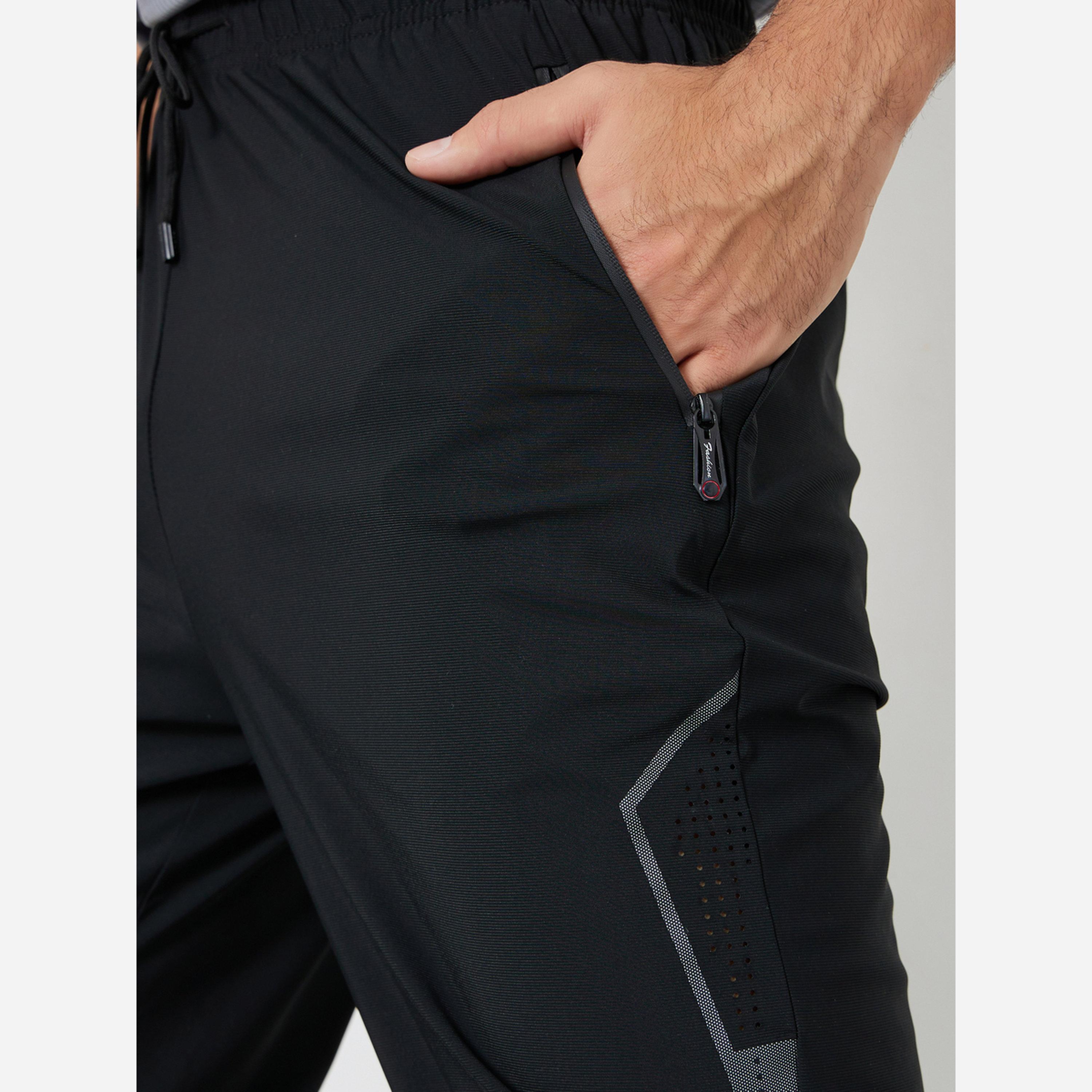 Styli Men Relaxed Track Pant with Side Print and Zipper Detail-men-clothing-sportswearandactivewear-bottoms-joggers-image-4