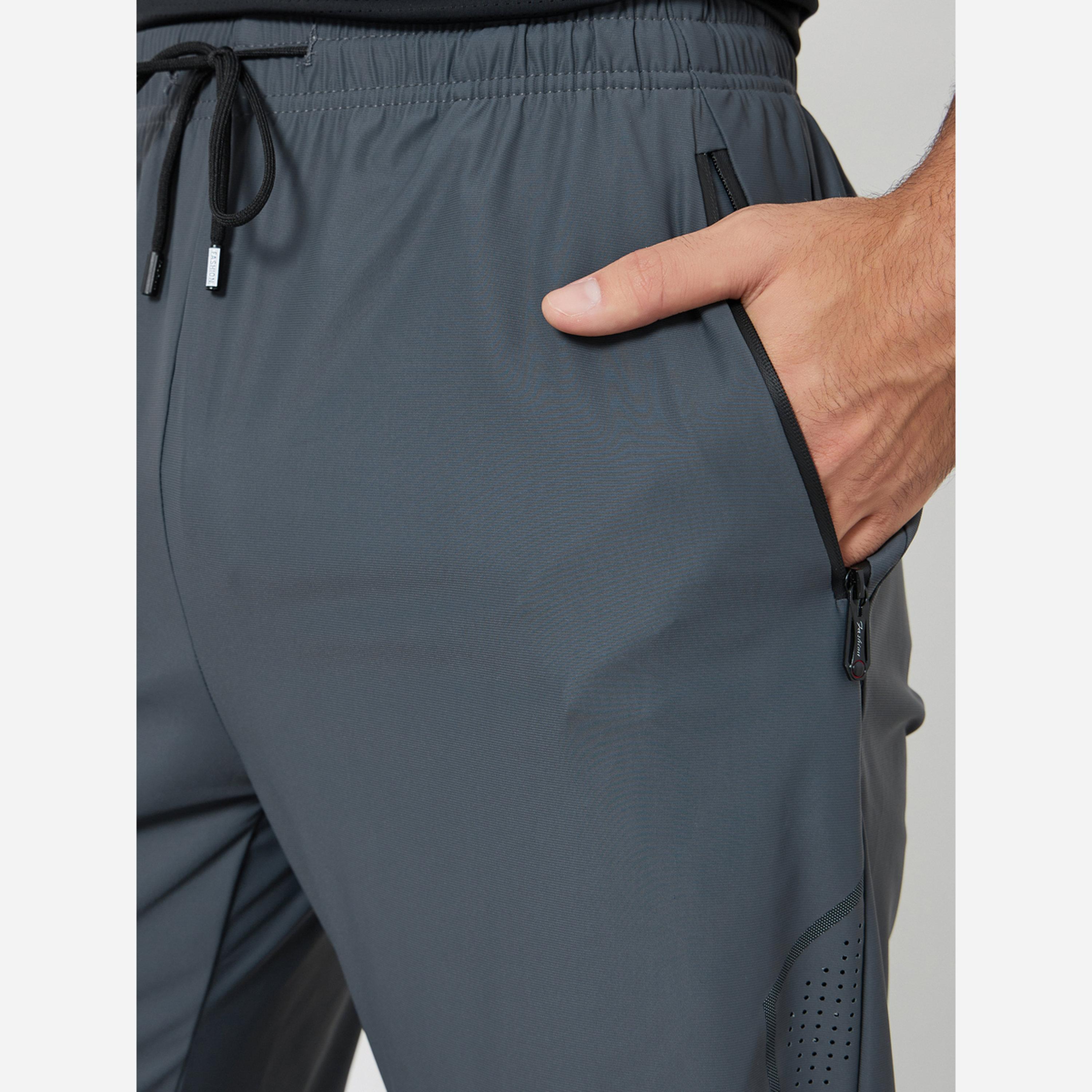Styli Men Relaxed Track Pant with Side Print and Zipper Detail-men-clothing-sportswearandactivewear-bottoms-joggers-image-4