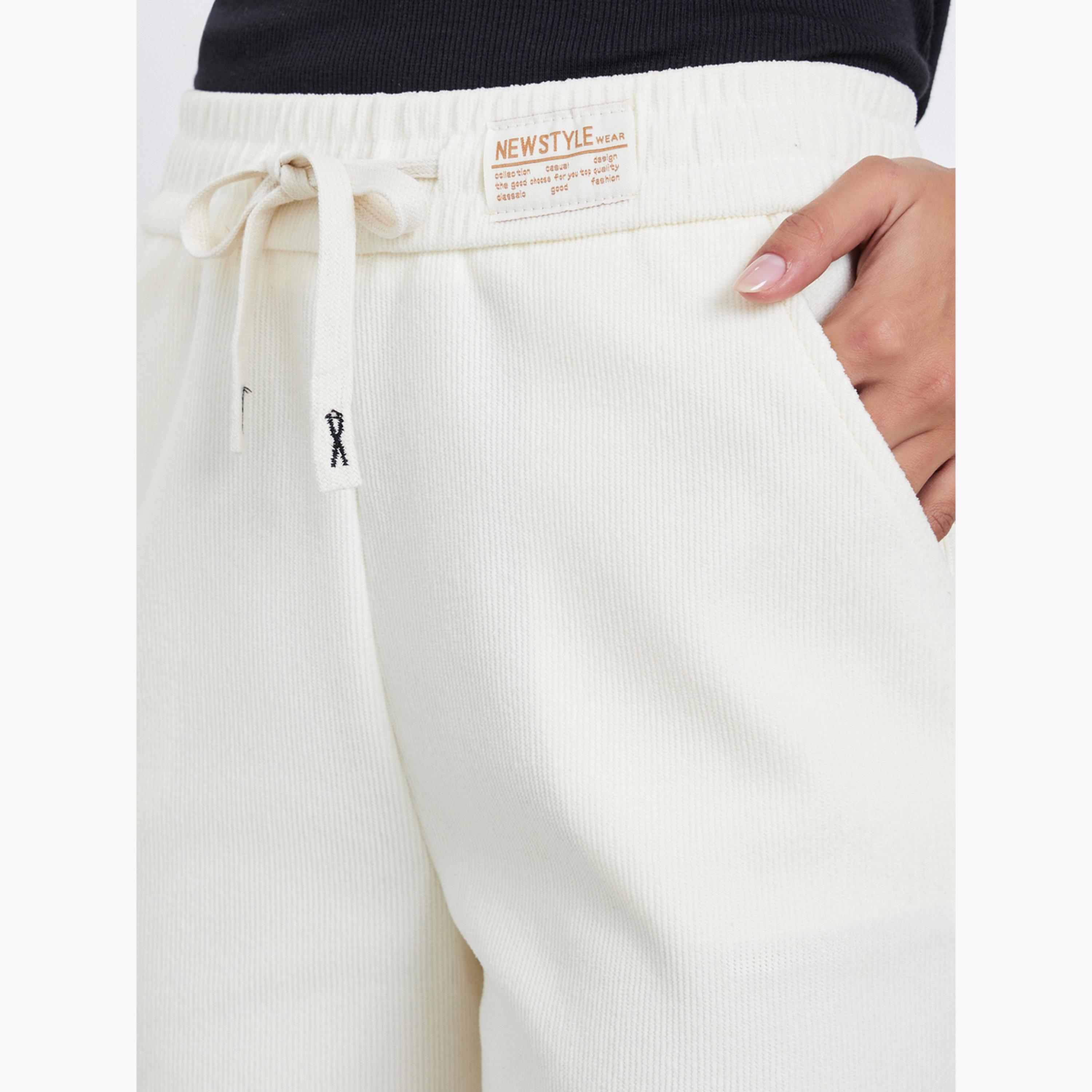 Styli Women Beige Solid Wide Leg Pants with Drawstring-women-clothing-bottoms-trousers-image-3