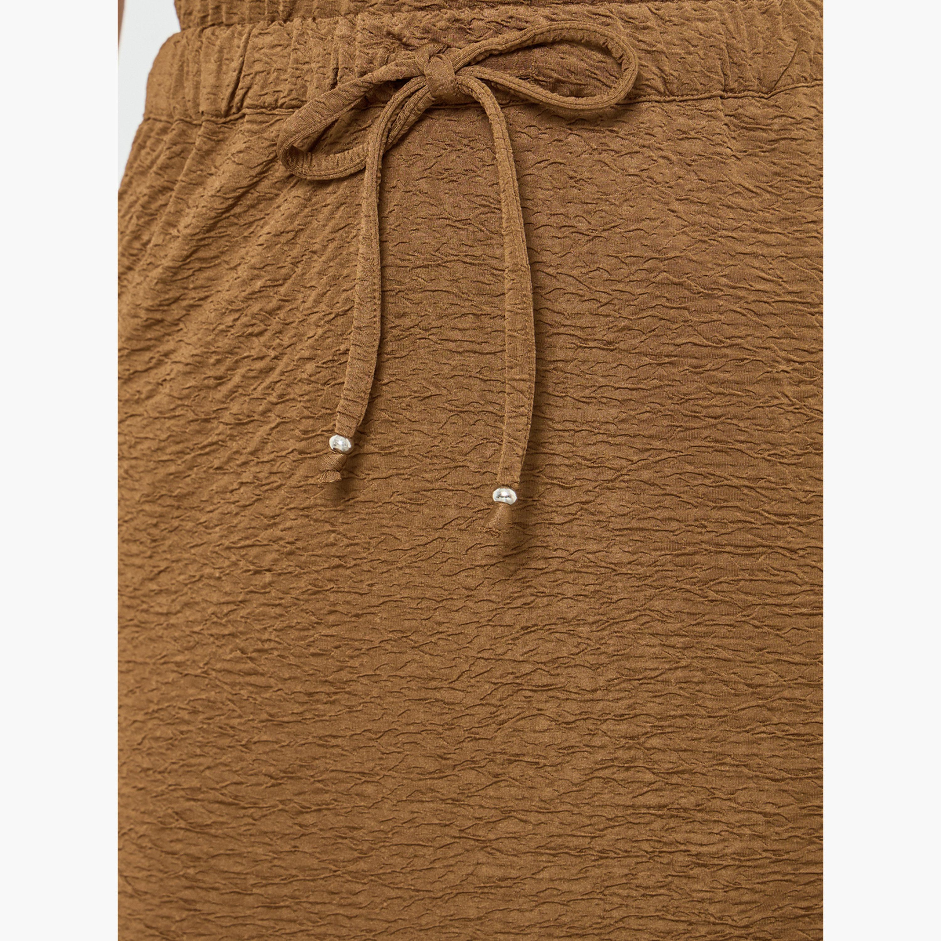 تنورة طويلة بتفاصيل بارزة الملمس وقصة مستقيمة-women-clothing-bottoms-skirts-image-4