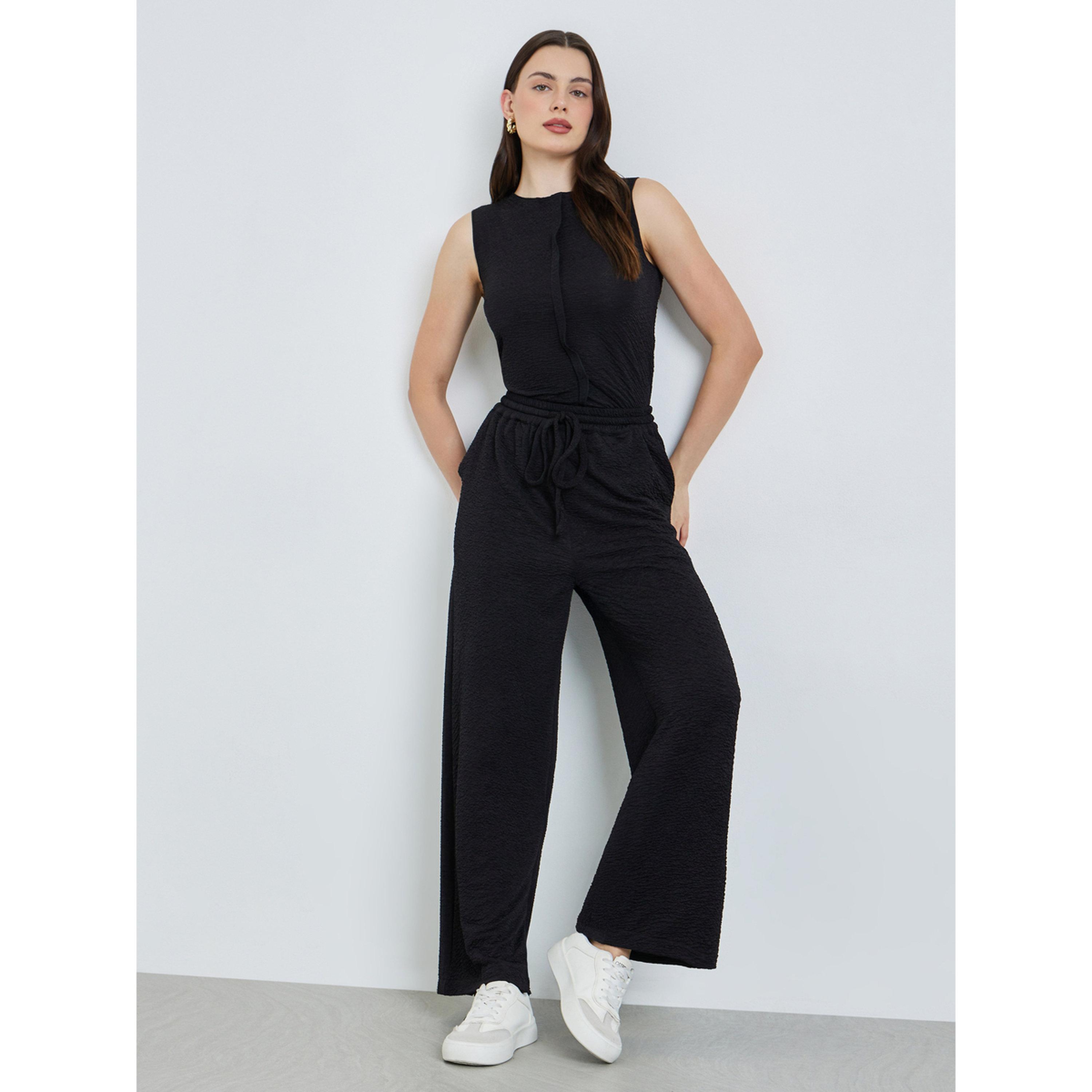 بنطال بأرجل واسعة ورباط لون أسود-women-clothing-bottoms-joggers-image-2