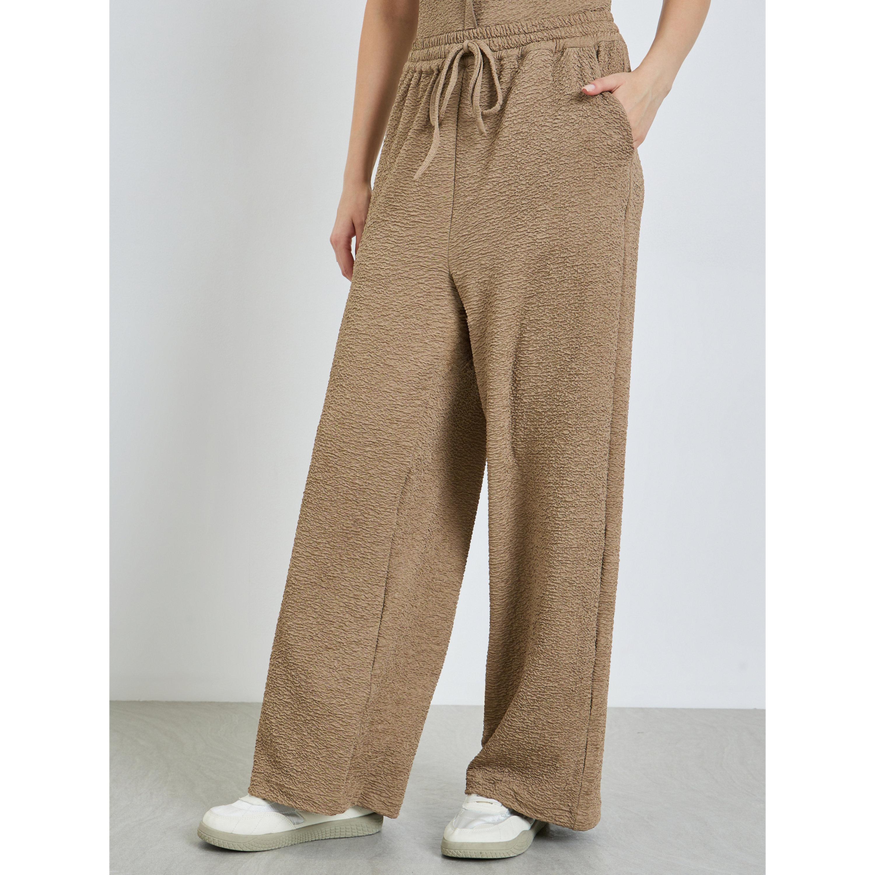 Styli Women Beige Textured Wide Leg Trousers-women-clothing-bottoms-trousers-image-1