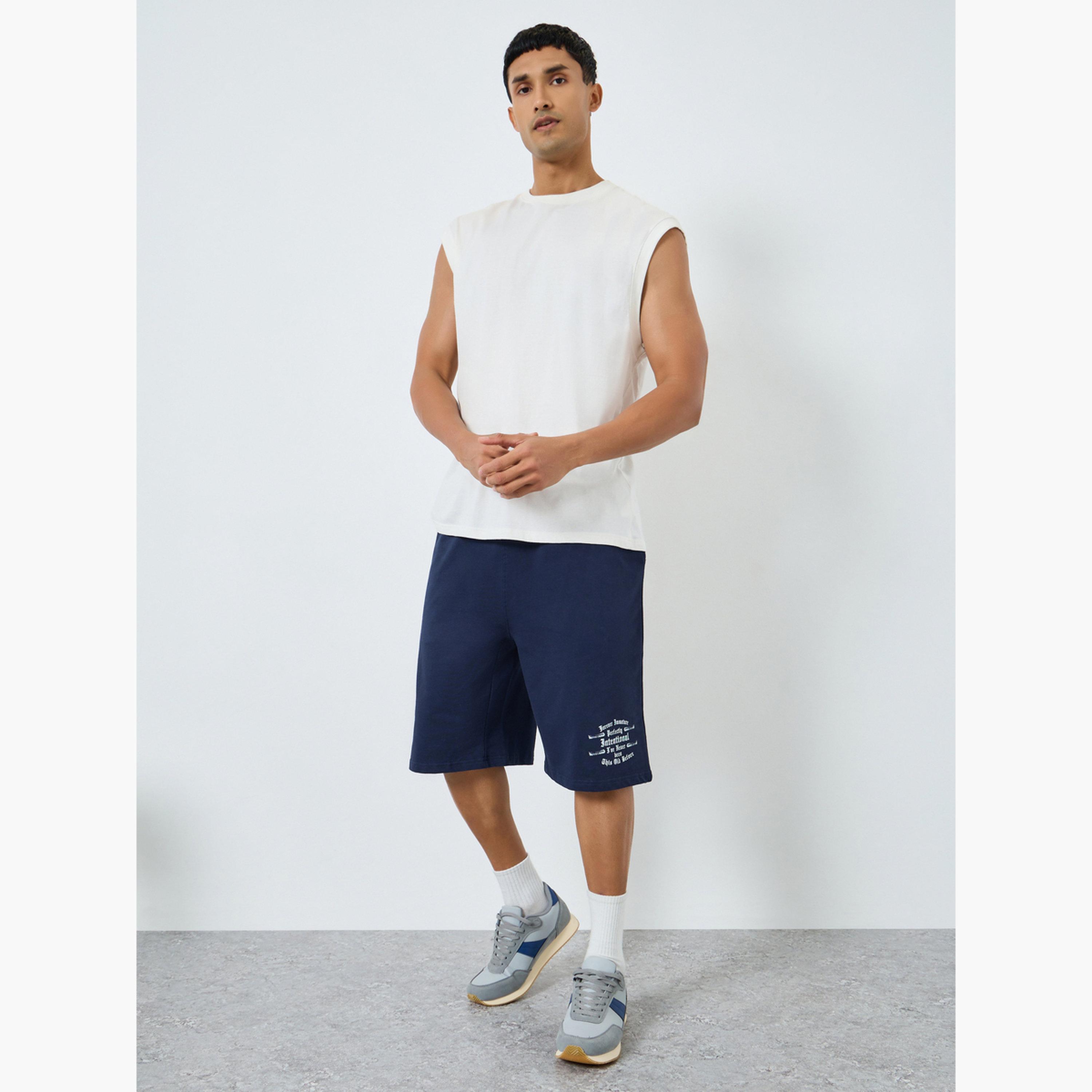 شورت بقصة واسعة مطبوع بمظهر باهت وممزق-men-clothing-bottoms-shorts-image-2