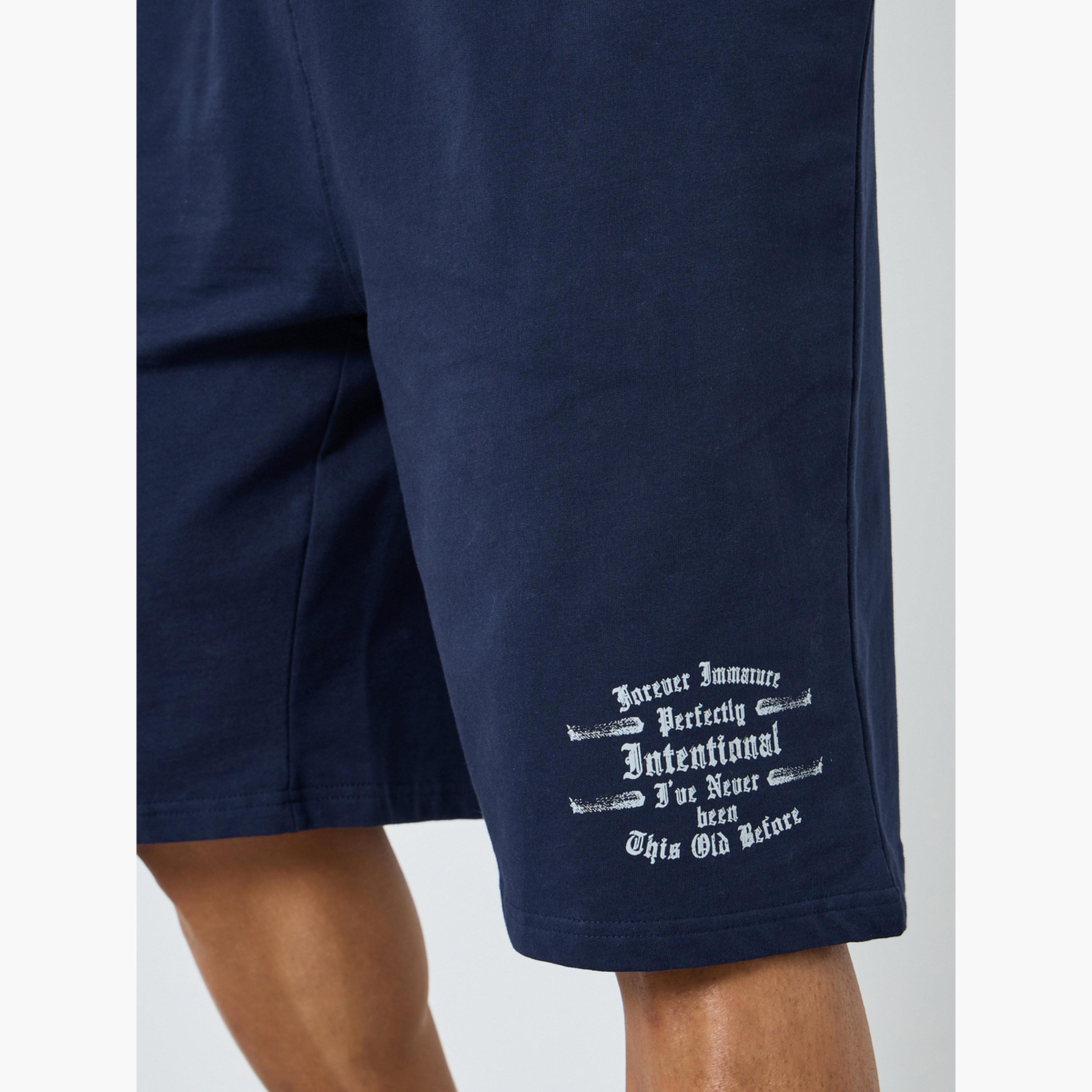 شورت بقصة واسعة مطبوع بمظهر باهت وممزق-men-clothing-bottoms-shorts-image-3
