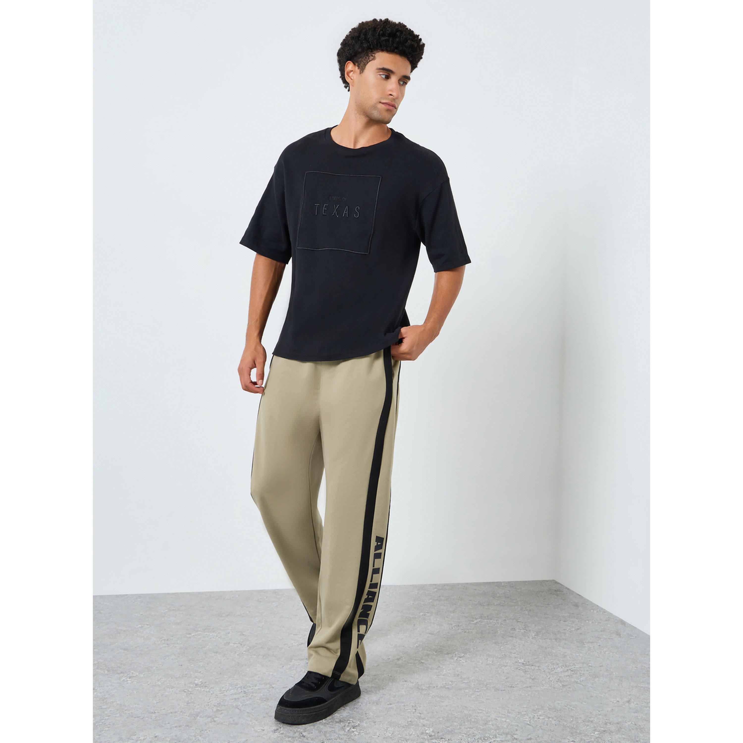 بنطال جوغر تيري رجالي فضفاض ومخطط-men-clothing-bottoms-joggers-image-2