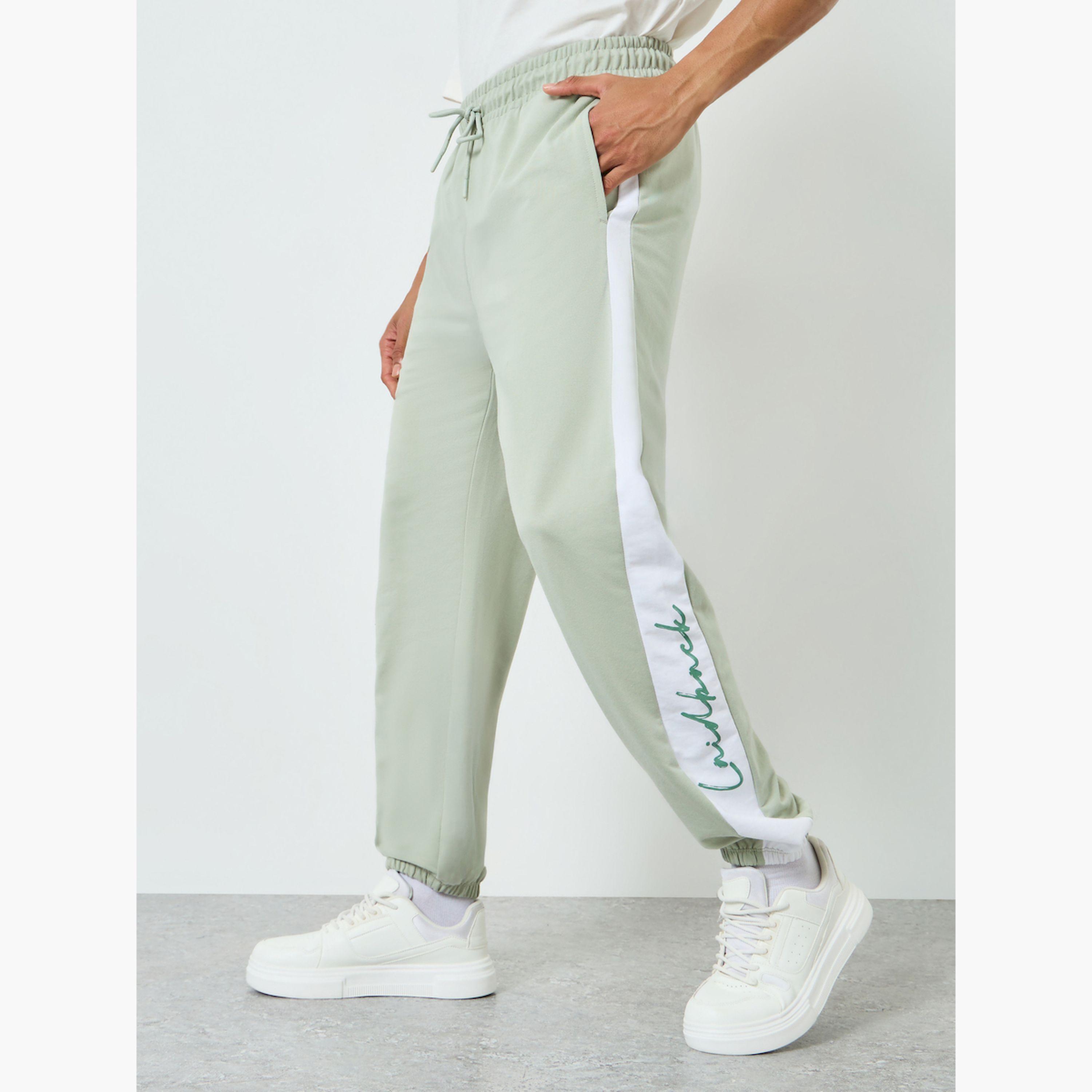 Styli Men Green Printed Side Stripe Joggers-men-clothing-bottoms-joggers-image-1