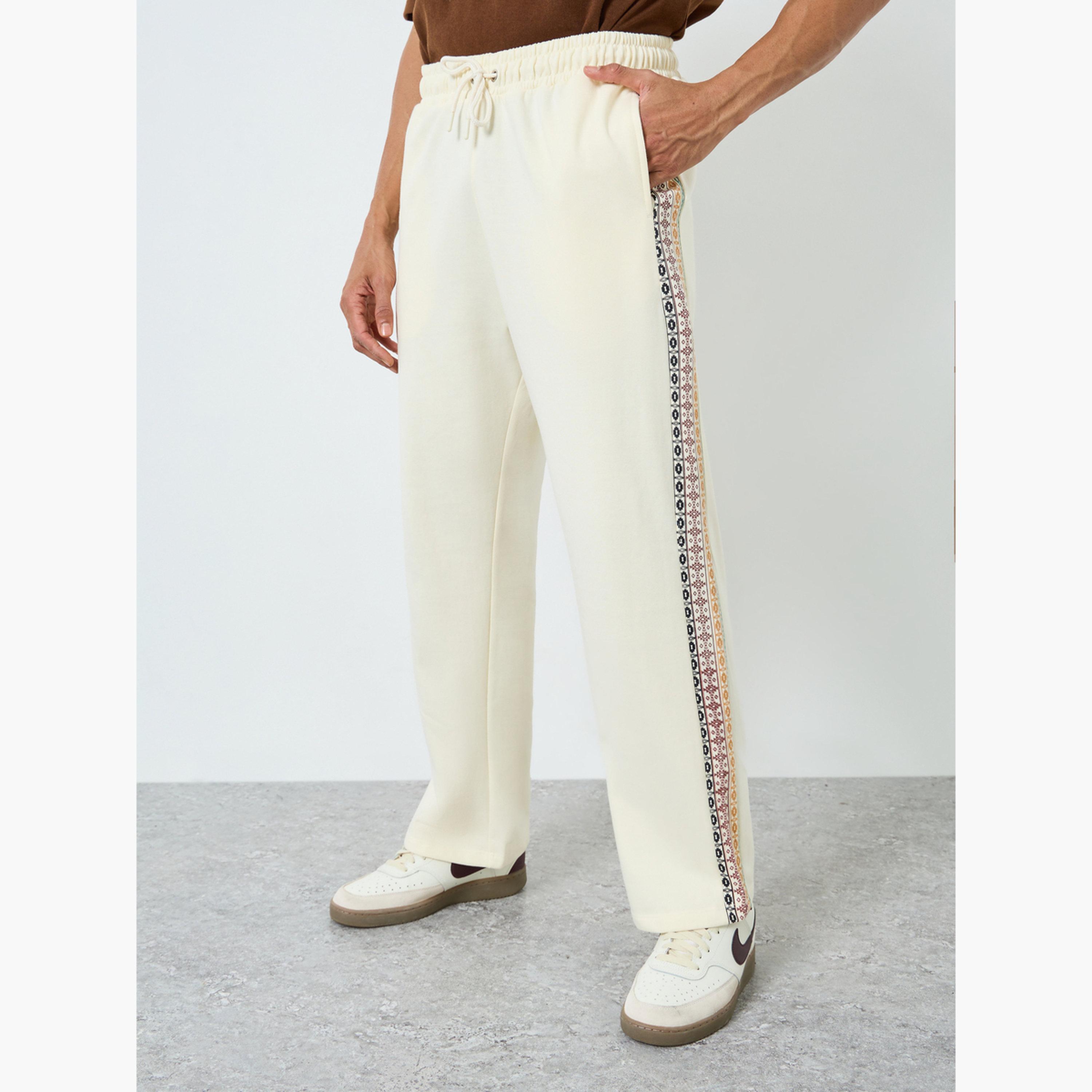 Styli Men Cream Printed Side Panel Joggers-men-clothing-bottoms-joggers-image-1