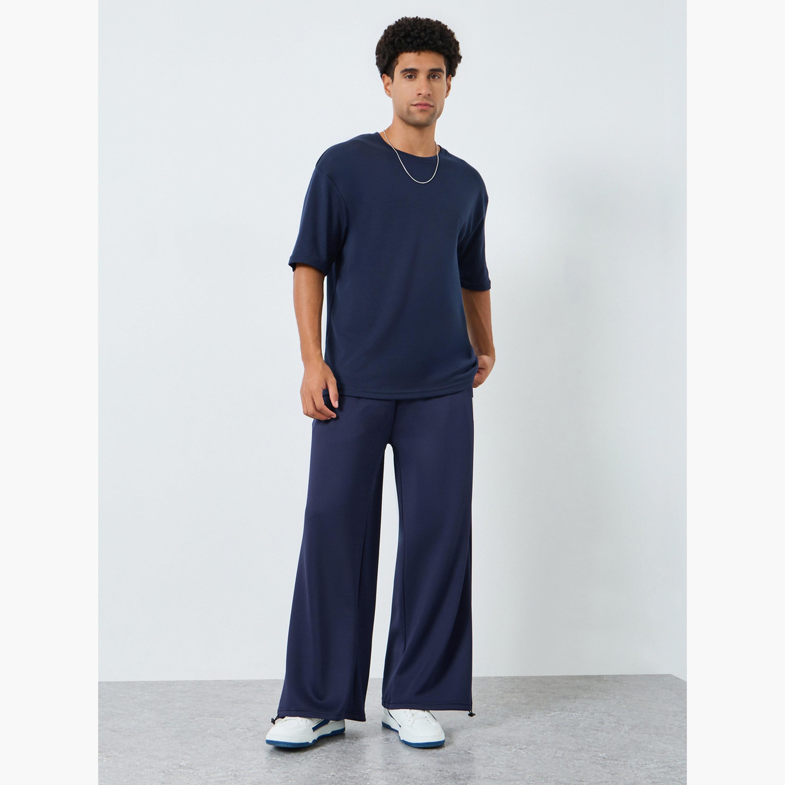 جوغر بأرجل واسعة-men-clothing-bottoms-joggers-image-2
