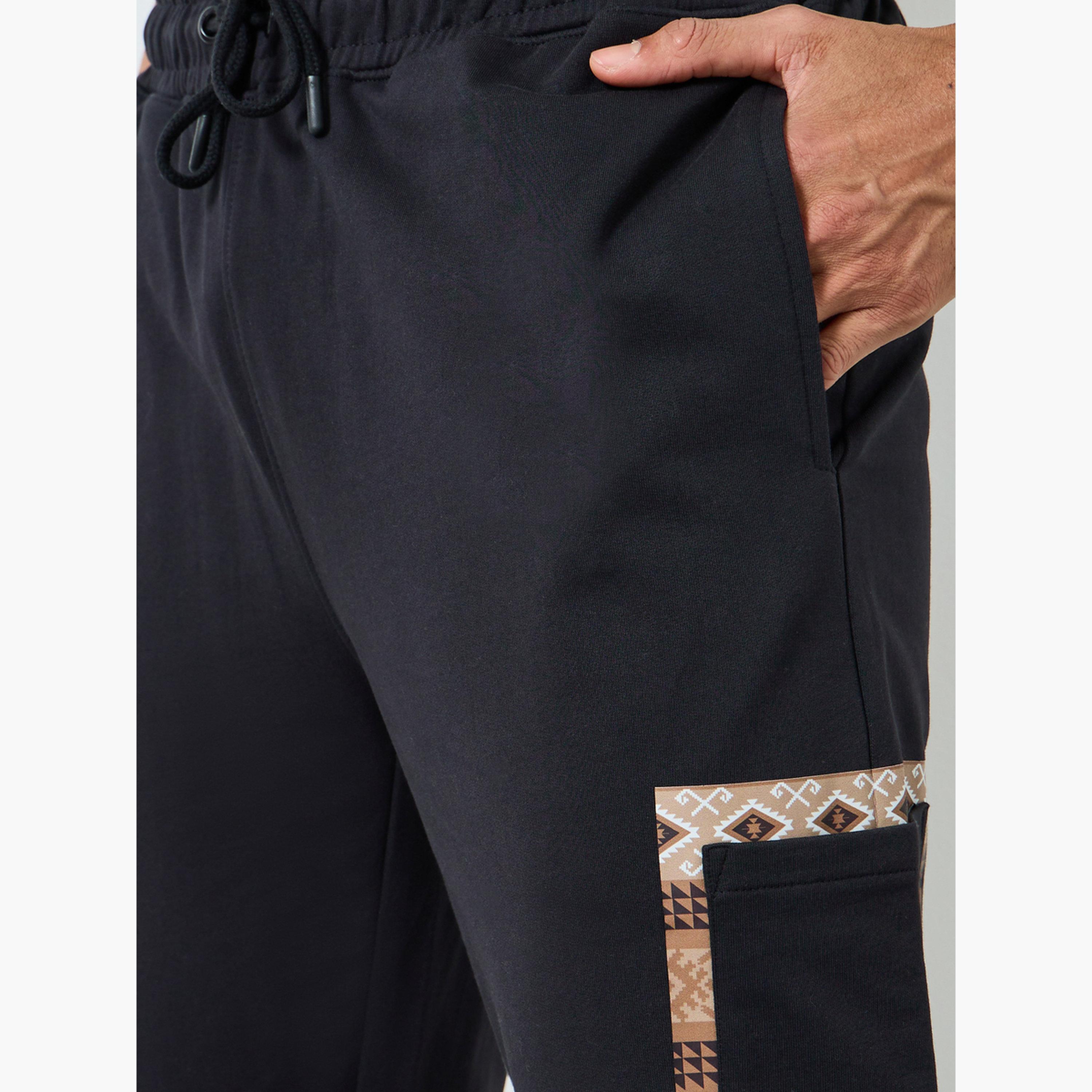 جوغر بطبعة جرافيك وقصة سليم فت-men-clothing-bottoms-joggers-image-3