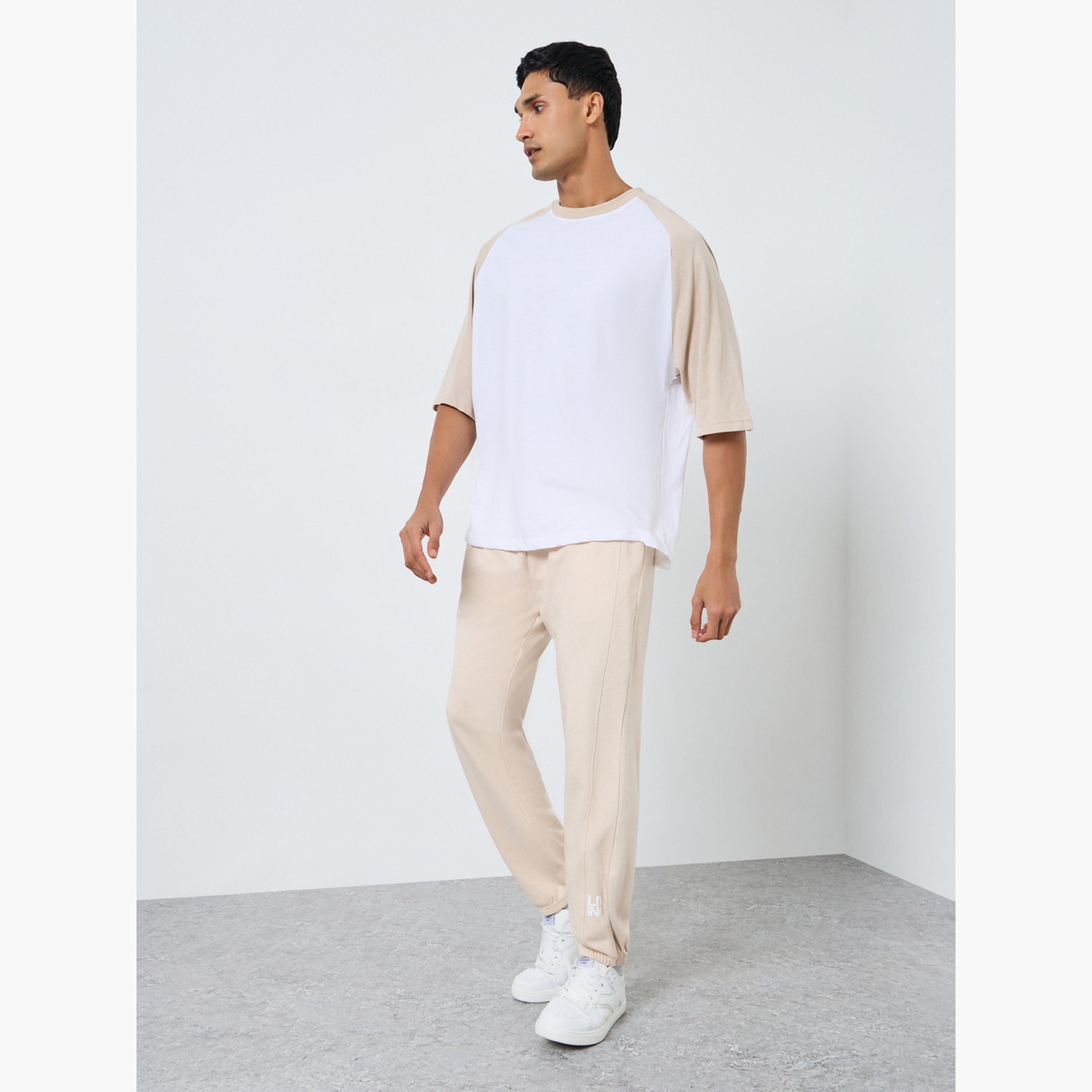 جوغر قصة ضيقة بطبعة أجزاء-men-clothing-bottoms-joggers-image-2