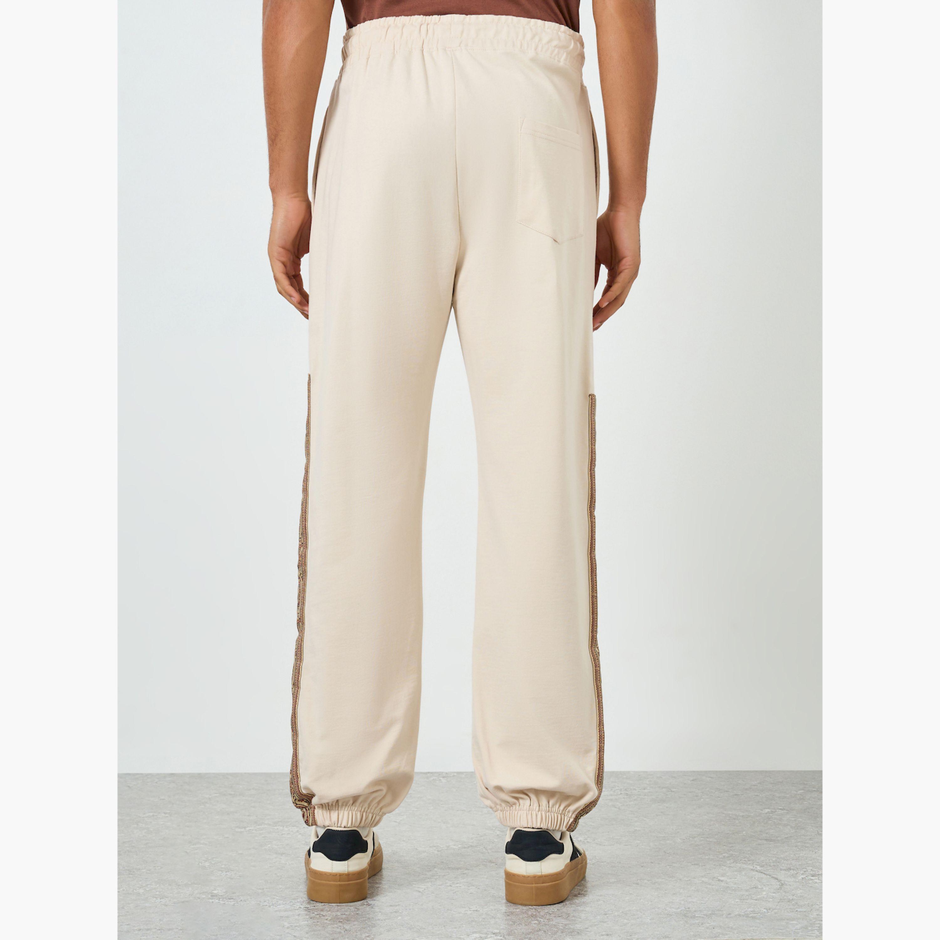Styli Men Beige Printed Side Panel Joggers-men-clothing-bottoms-joggers-image-5