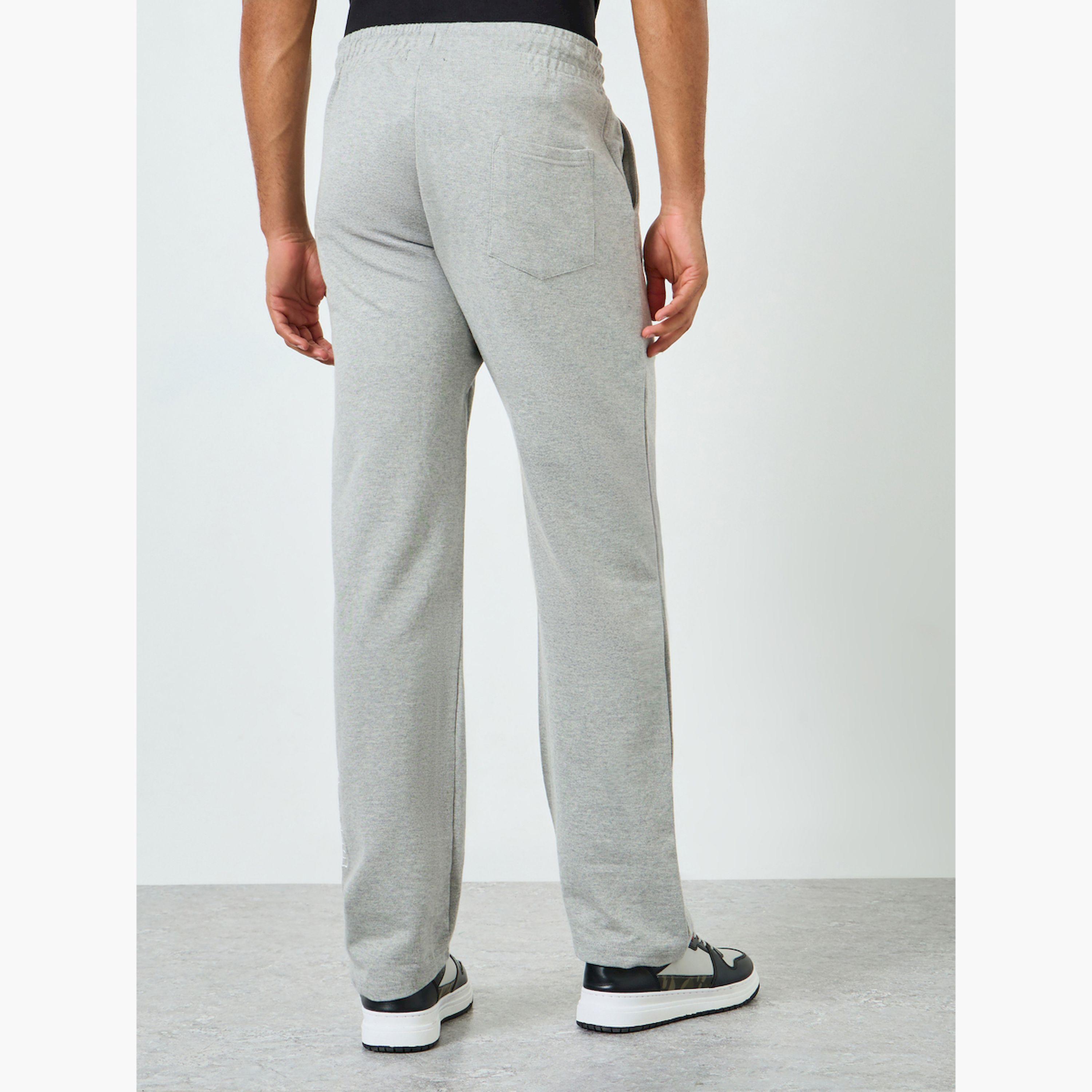 جوغر تيري بقصة أرجس مستقيمة وتفاصيل مُطرّزة-men-clothing-bottoms-joggers-image-5