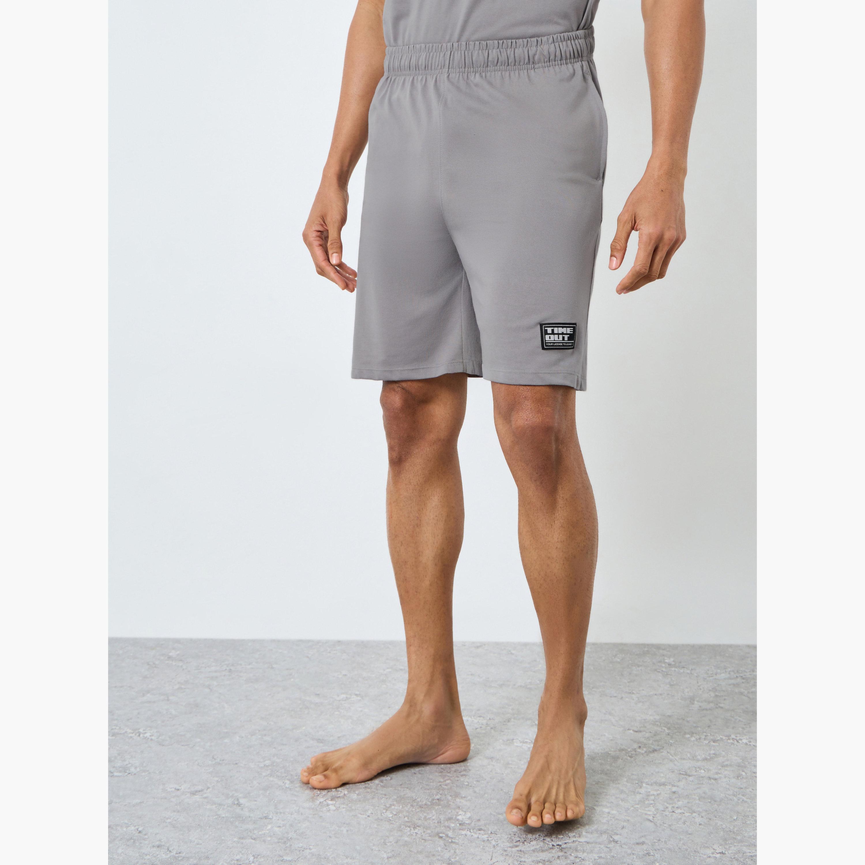 مجموعة من شورت وتيشيرت قطن بطبعة كتابة-men-clothing-nightwear-sets-image-4