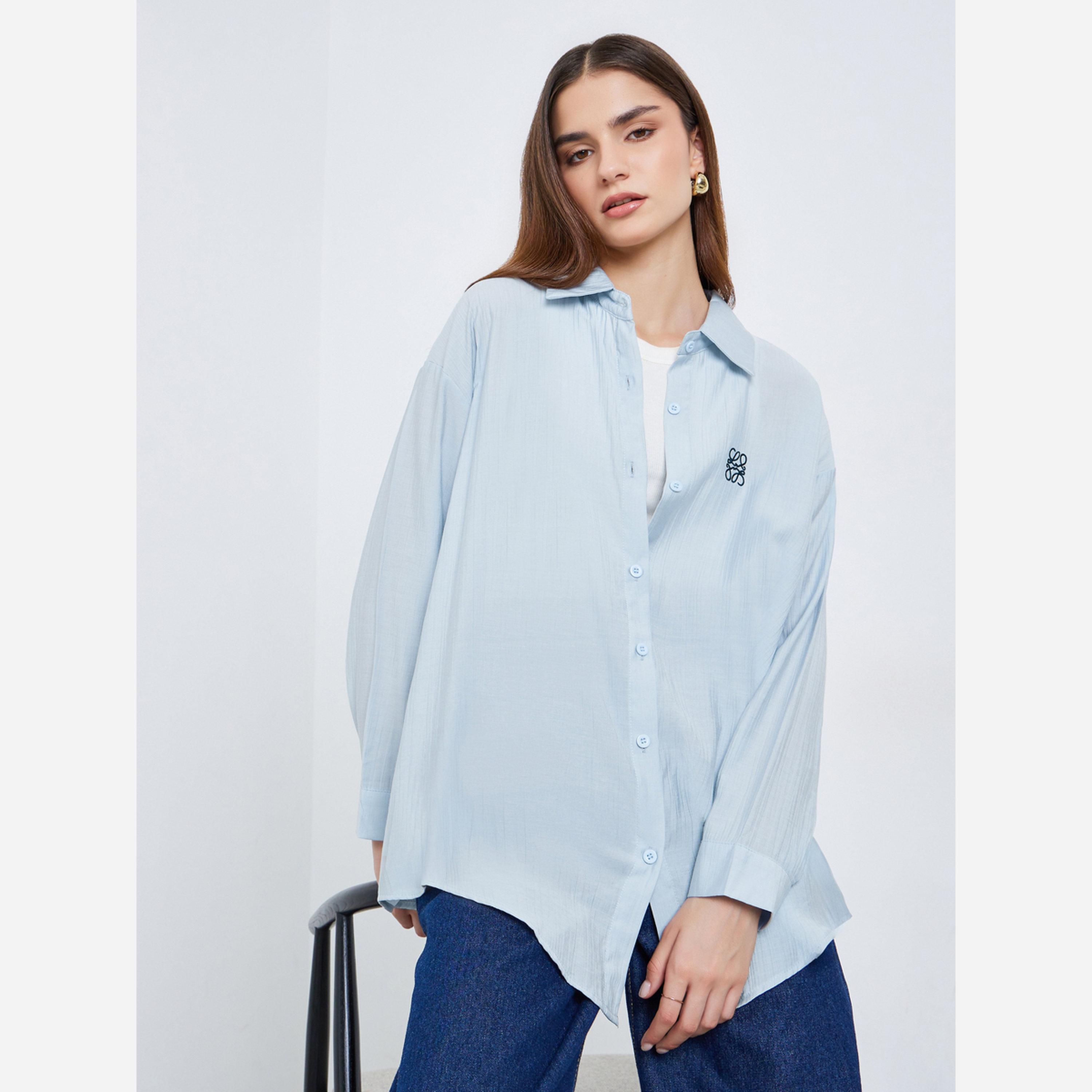 ستايلي - قميص نسائي لون أزرق فاتح مقاس واسع بتفاصيل مطرزة-women-clothing-shirtsandblouses-shirts-image-1
