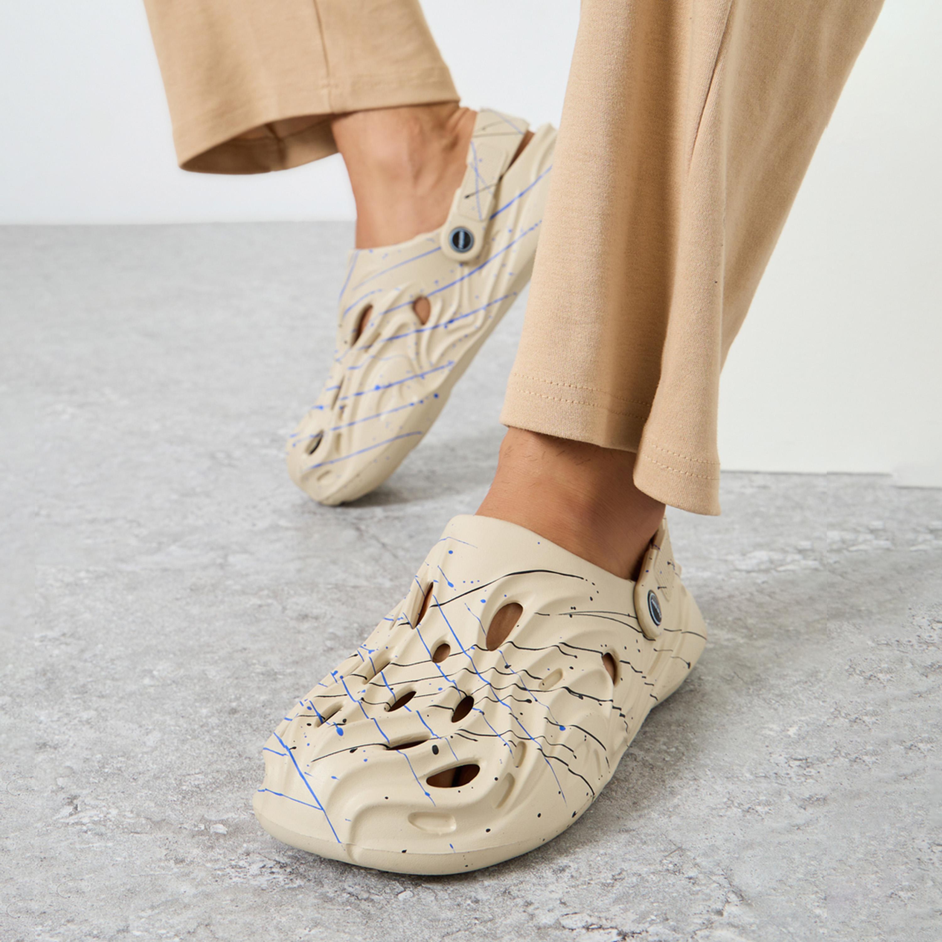 ستايلي - شبشب سهل الارتداء بطبعة ونقش محدد-men-shoes-flipflopsandslides-image-2