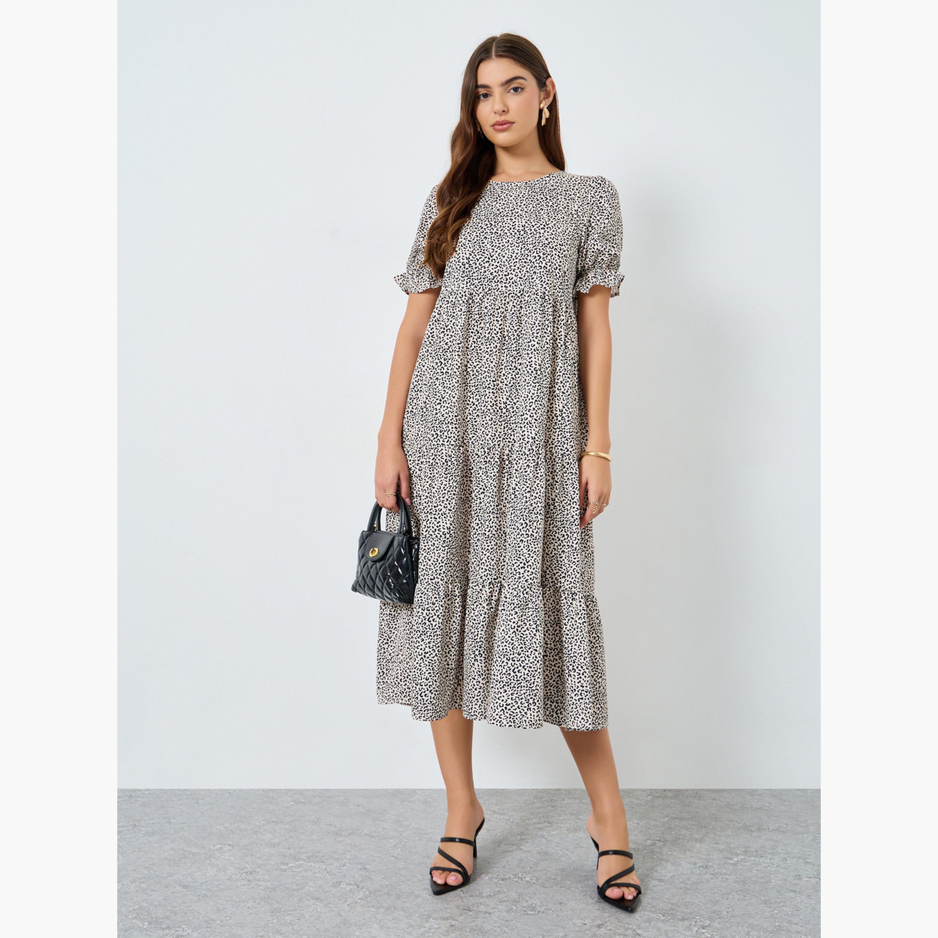 تيك تو - فستان متوسط الطول بطبعة الفهد بياقة دائرية تصميم واسع من الأسفل-women-clothing-dresses-image-1