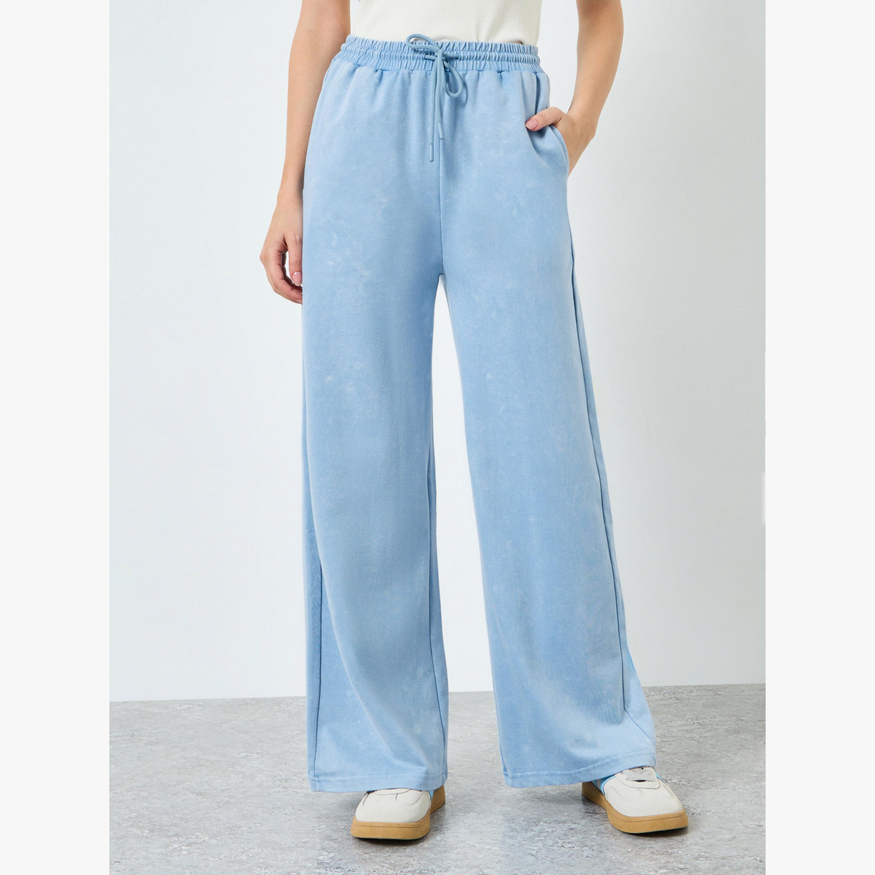 جوغر قطن بأرجل واسعة وغسيل باهت-women-clothing-bottoms-joggers-image-1