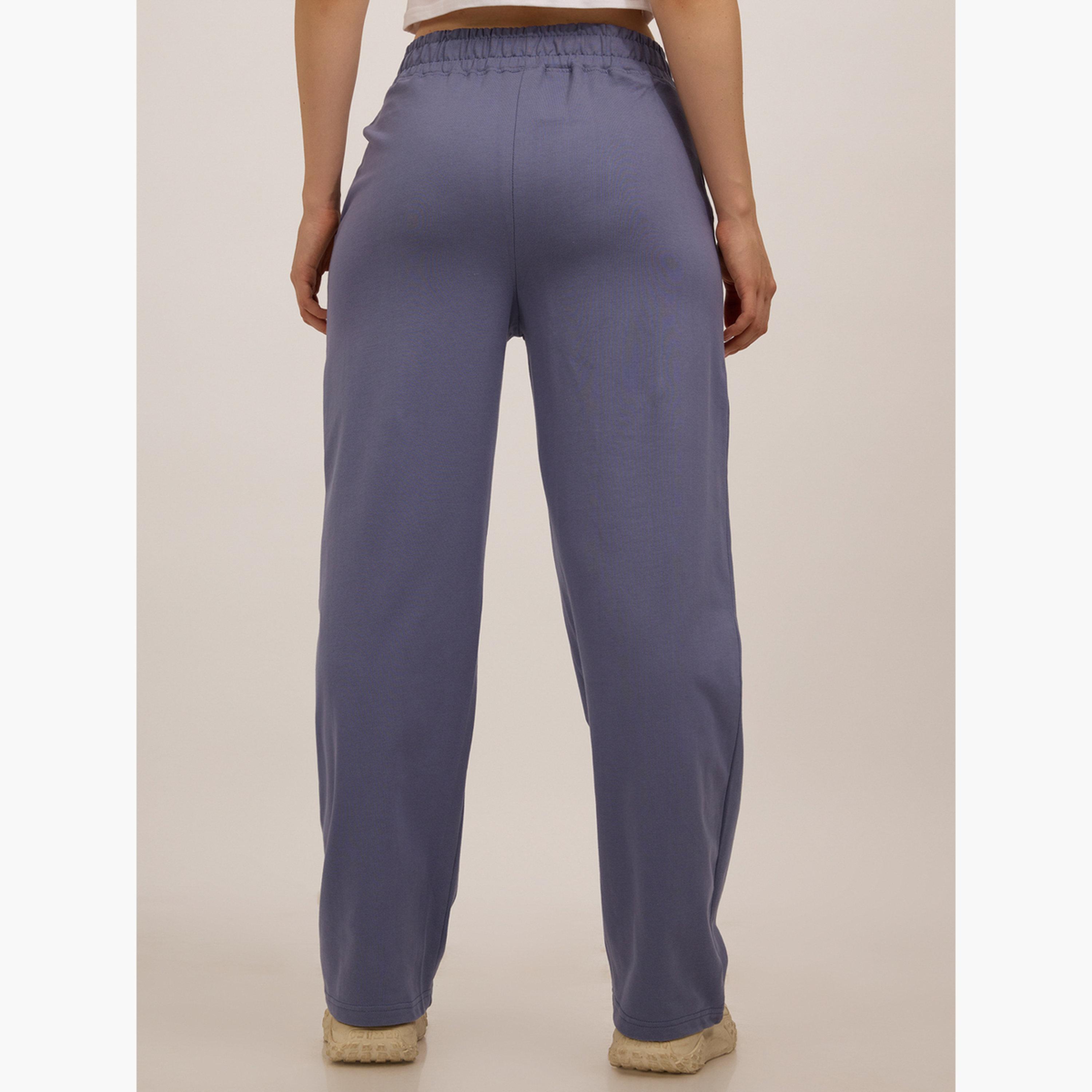 أوتزيدر × ستايلي - بنطال رياضي أزرق مطبوع ومقص وخياطة جانبية-women-clothing-bottoms-joggers-image-4