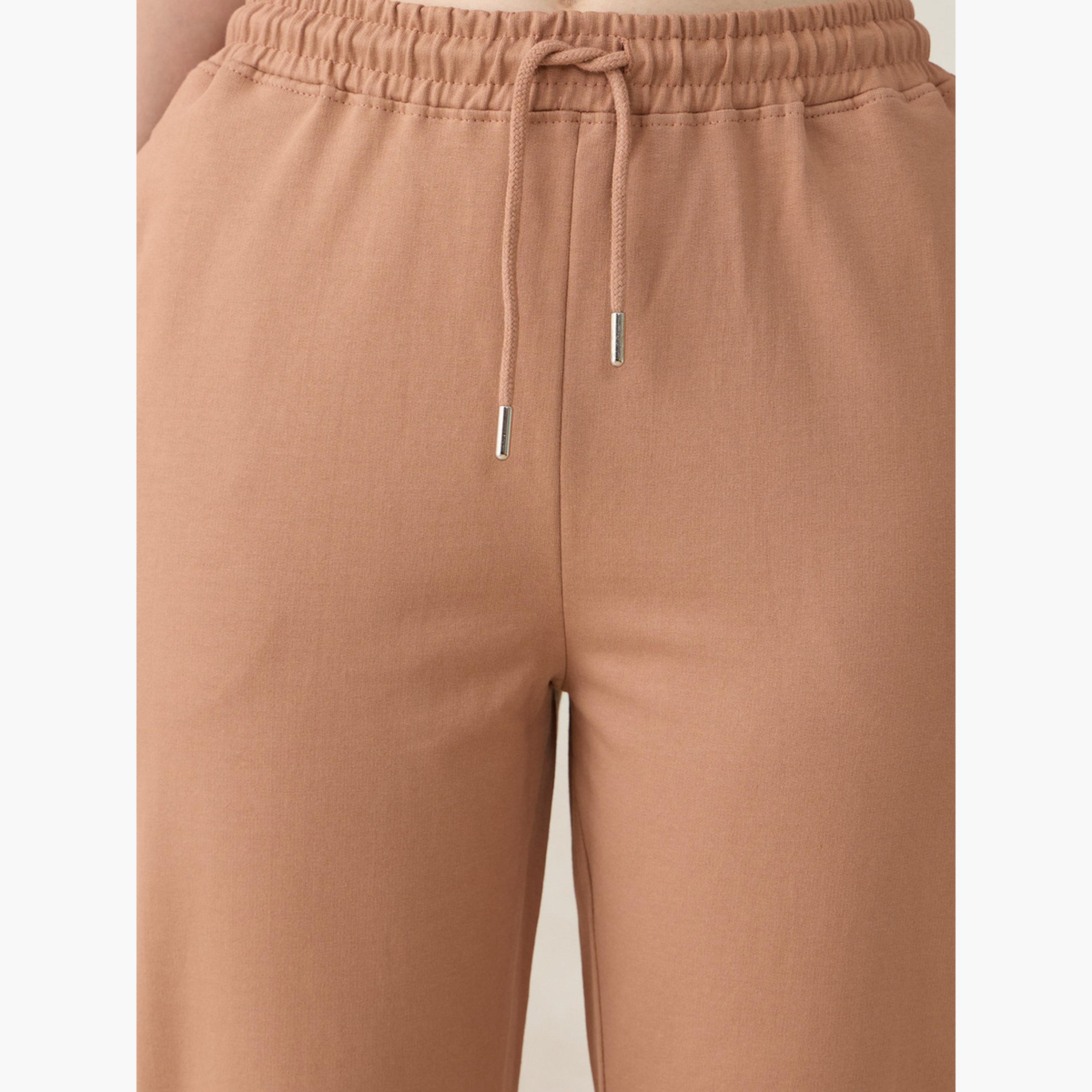 Outzidr X Styli Brown Basic Solid Flared Joggers-women-clothing-bottoms-joggers-image-4