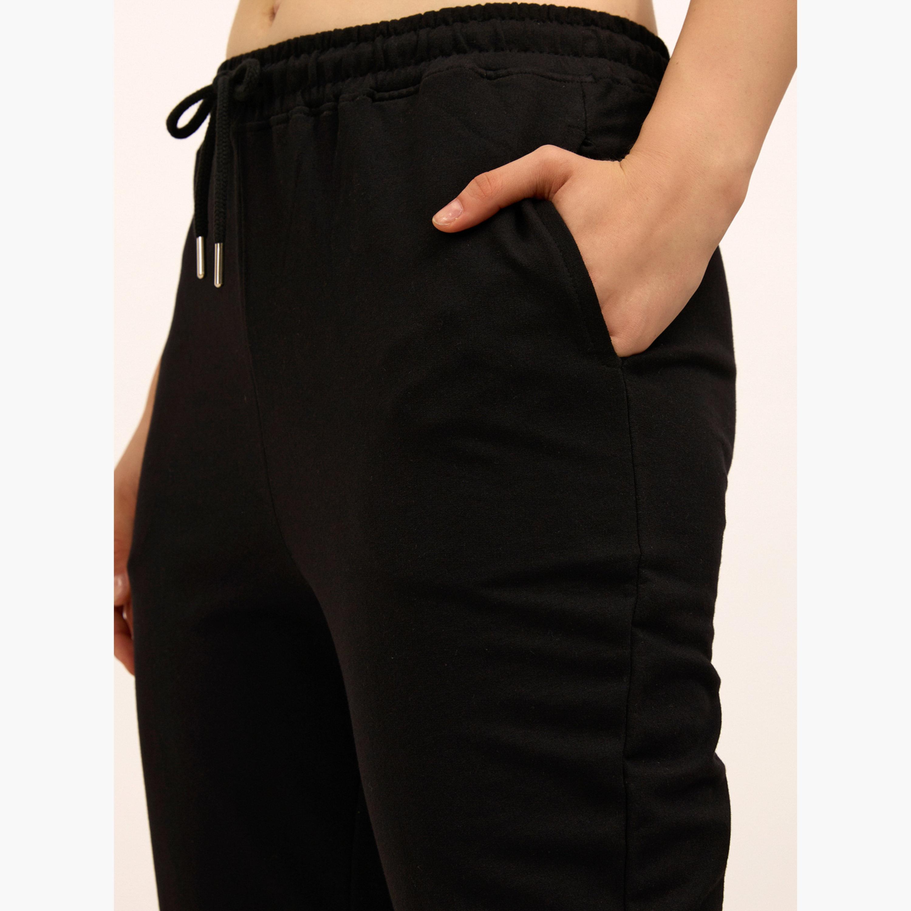 Outzidr X Styli Black Basic Solid Flared Joggers-women-clothing-bottoms-joggers-image-3