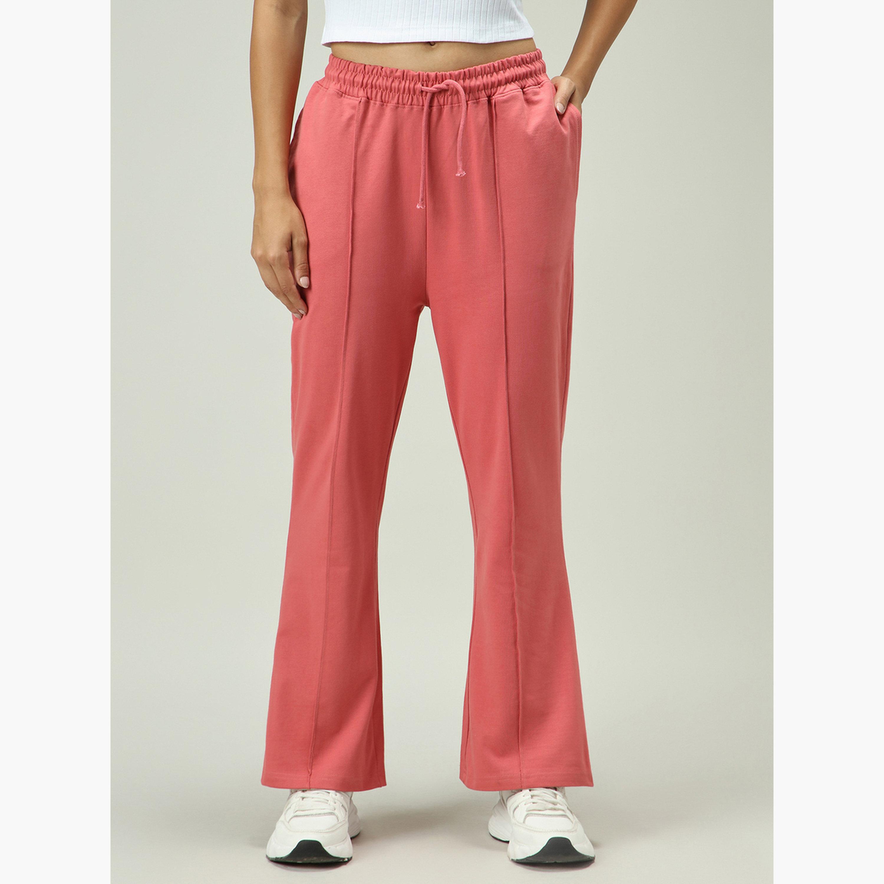 Outzidr X Styli Pink Solid Pintuck Flared Joggers-women-clothing-bottoms-joggers-image-1
